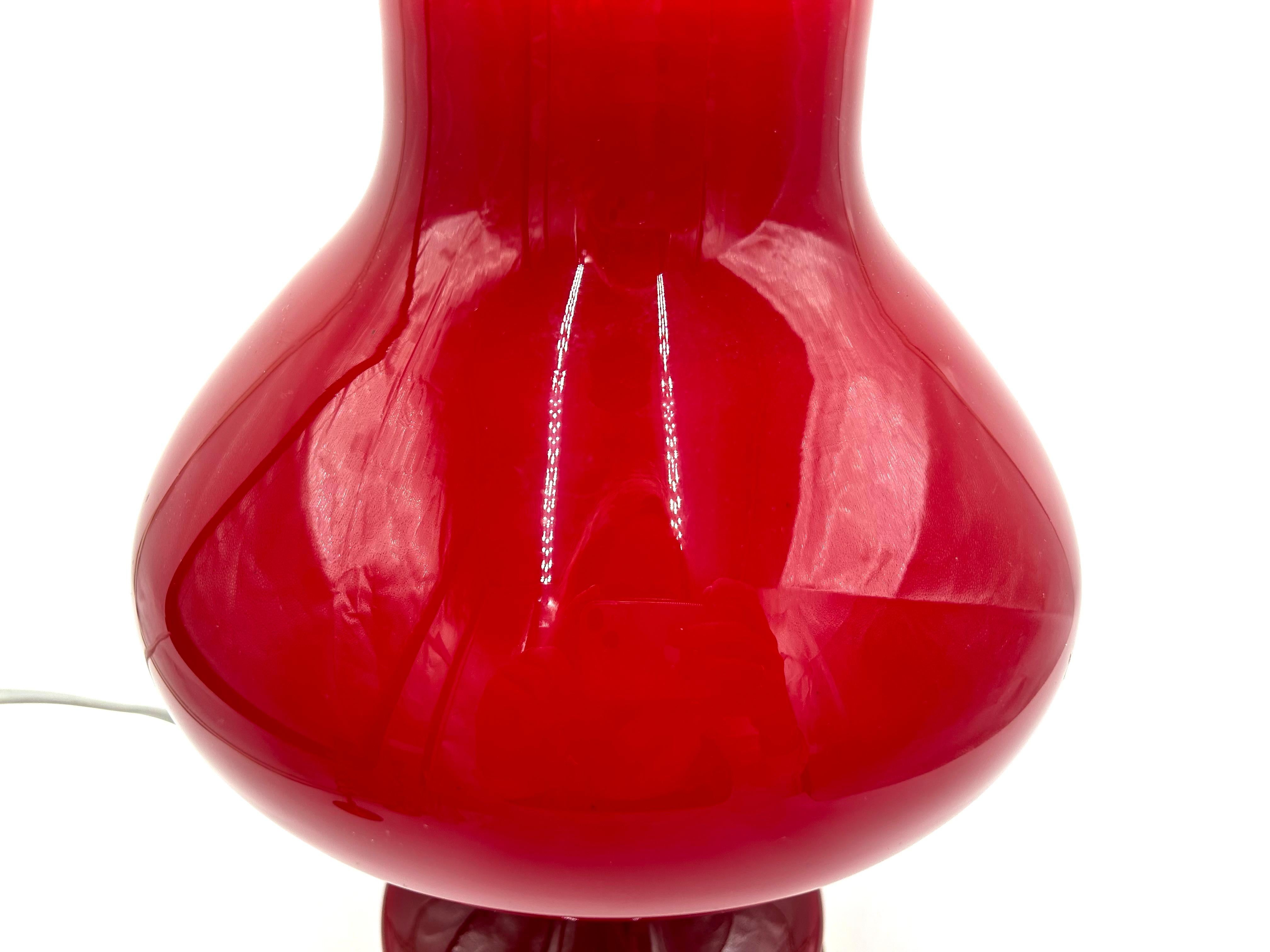 Red glass table lamp designed by Stephan Tabera, manufactured by OPP Jihlava in Czechoslovakia around 1970. Very good condition without damage.

Efficient lamp, bulb E27 thread.

height: 35cm

diameter: 25cm