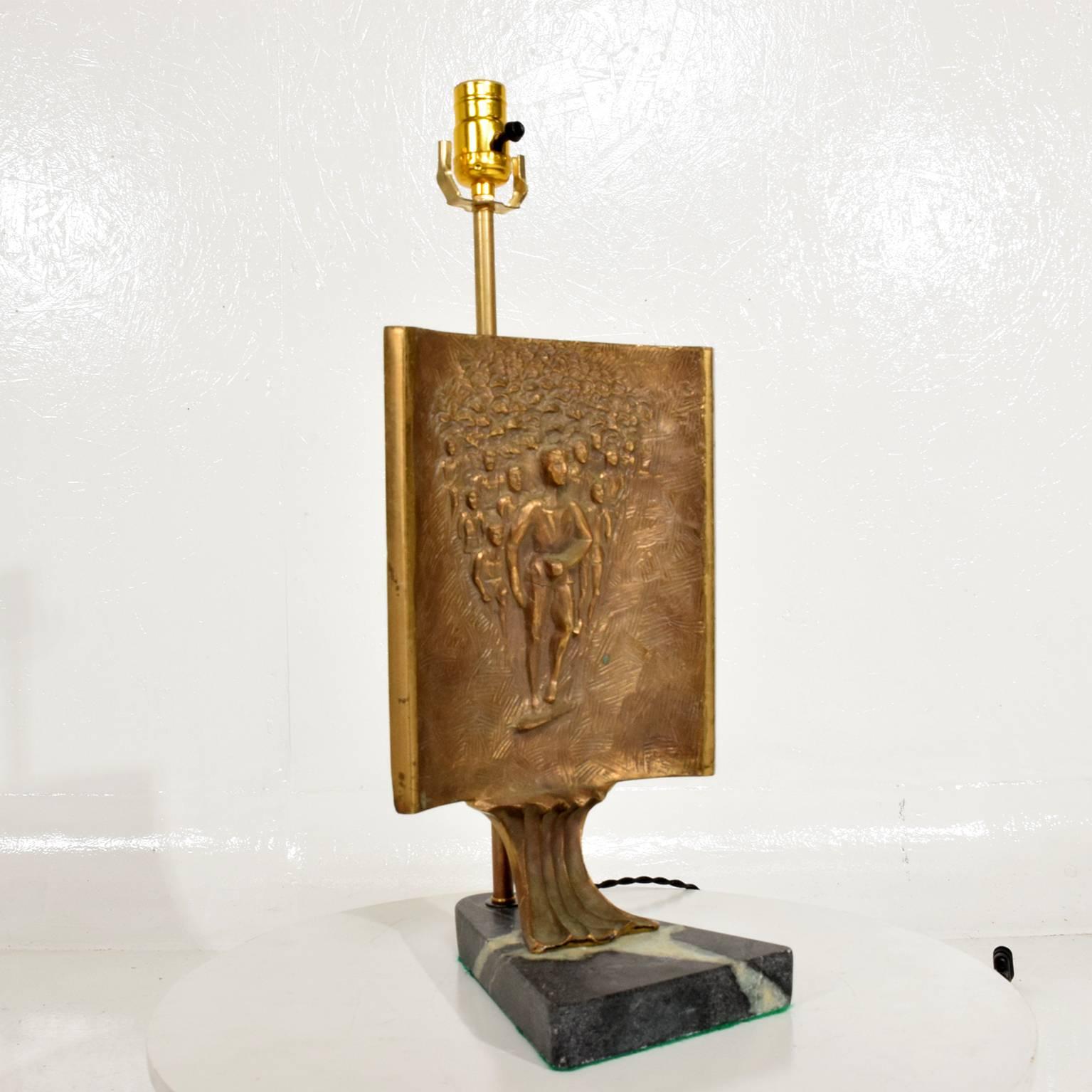 For your consideration, Mid-Century Modern table lamp with Italia bronze Brutalist sculpture.
The new base in green marble gives a great contrast to the patinated bronze sculpture. 
Sculpture comes from Italy, circa 1950s.
Rewired, no shade
