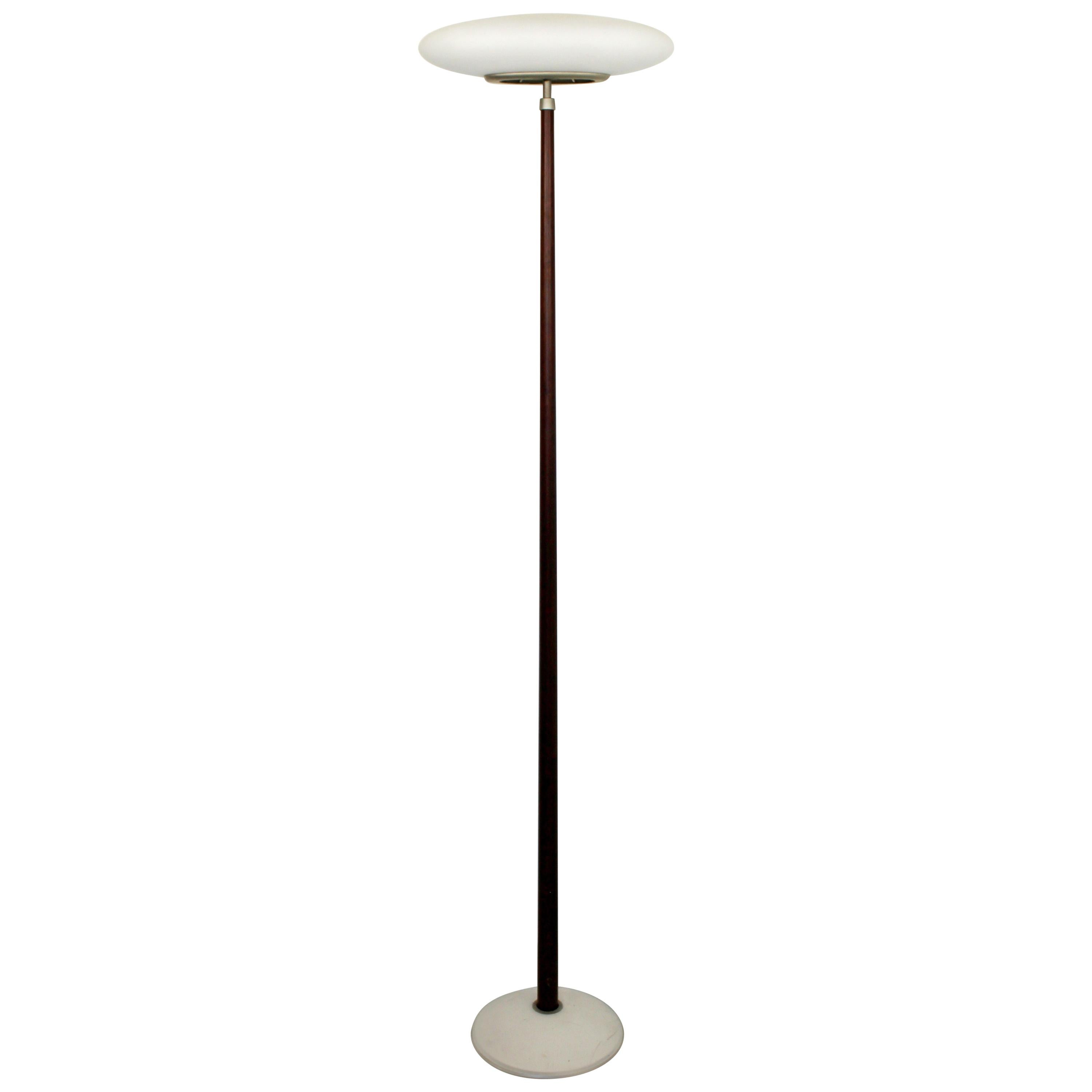 For your consideration is a fantastic and tall, wood floor lamp, with an oval glass shade, by Arkitektura, circa 1980s. In good vintage condition. The dimensions are 17