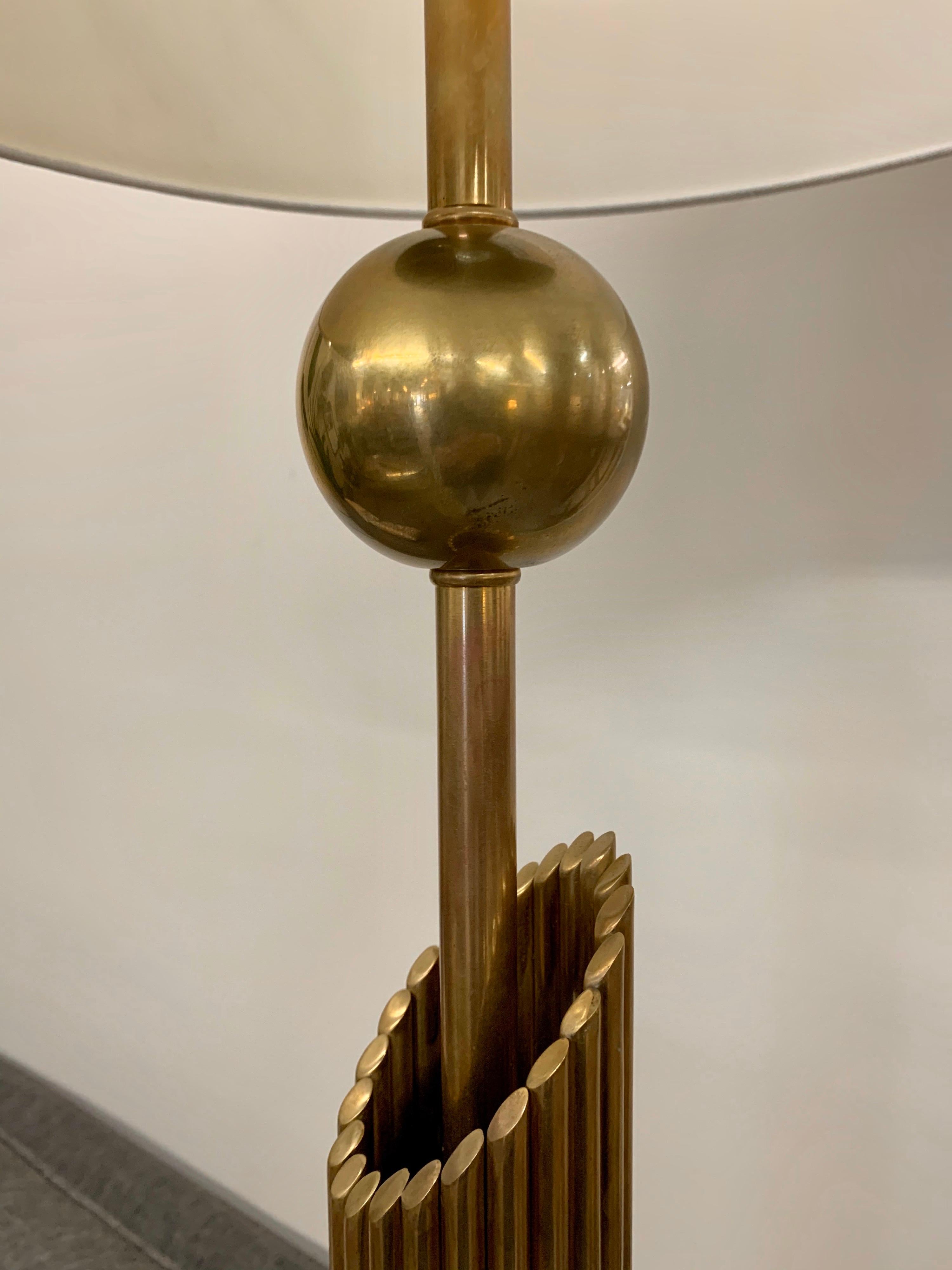 Stunning Mid-Century Modern tall floor lamp made of brass. Iconic modern looks and lines.