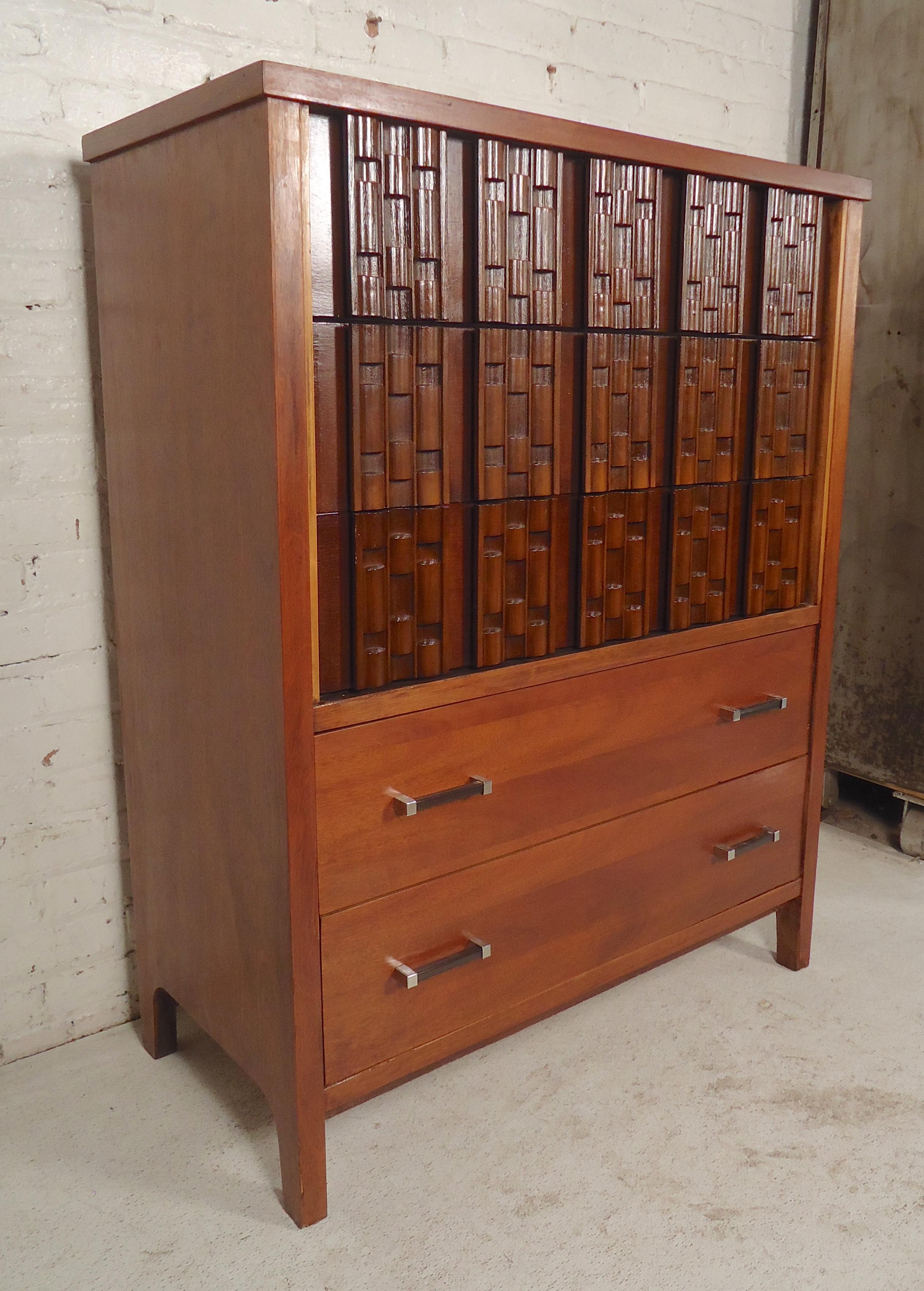 Unique chest of drawers with sculpted mosaic front pattern, black handles with chrome.

(Please confirm item location - NY or NJ - with dealer).
   