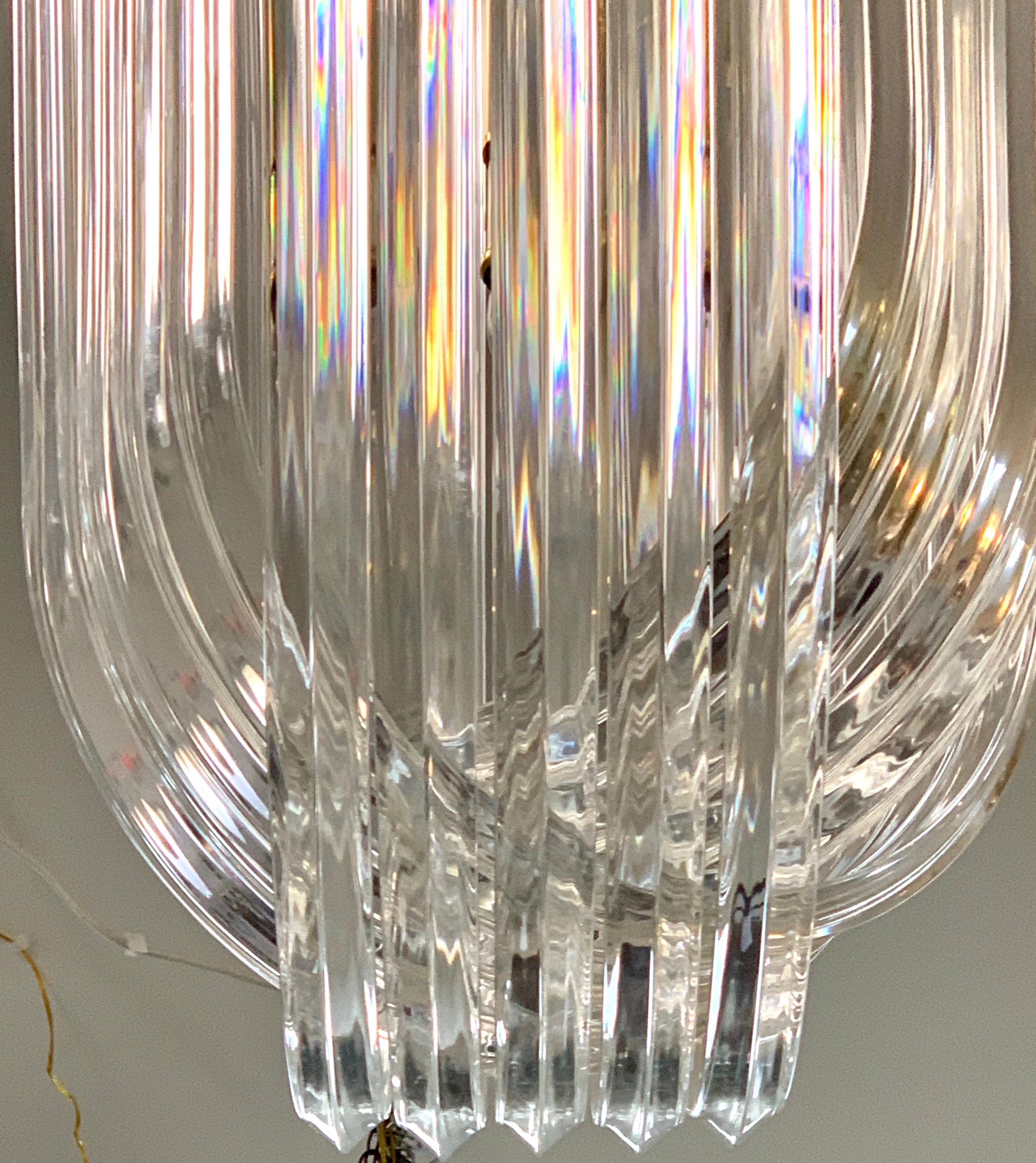 American Mid-Century Modern Tall Sculptural Curved Lucite Chandelier For Sale