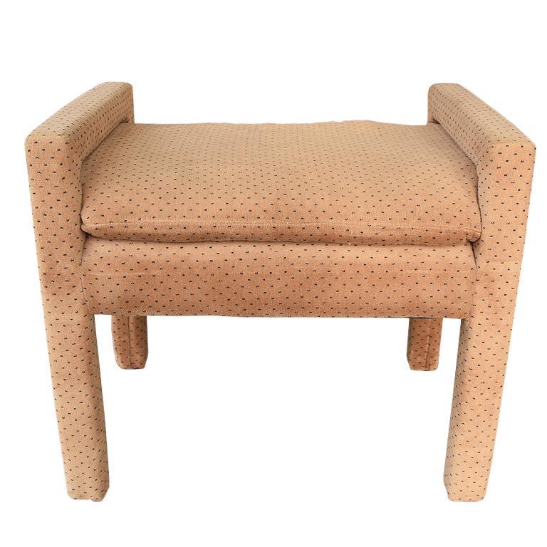 Function and form unite in this Mid-Century Modern bench. Tan in color with a dark blue French dot Dalmatian pattern as an accent, this Parsons style rectangular bench attributed to Milo Baughman is a rare beauty. Midcentury in style, it features a