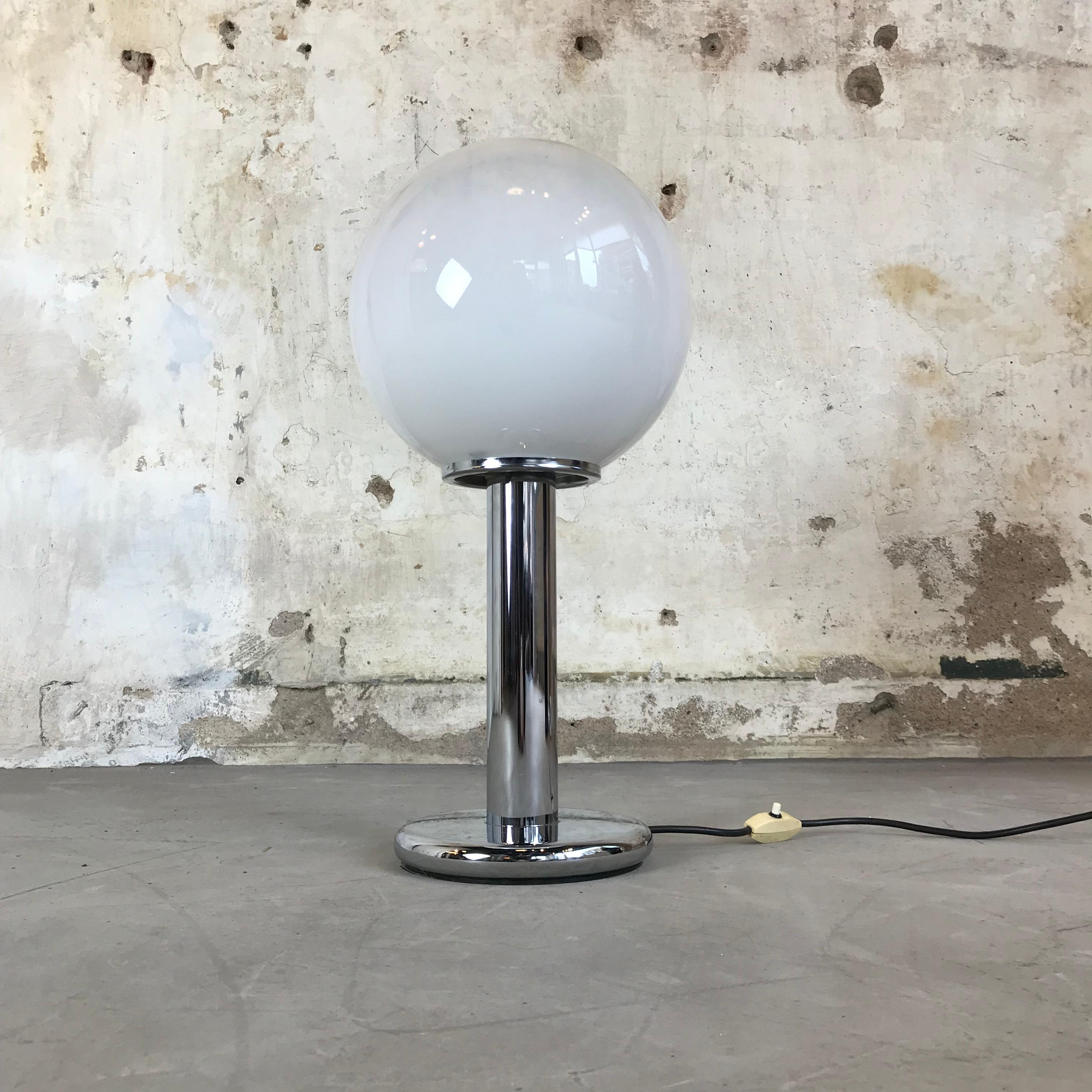 Large and beautiful table or desk lamp by Targetti Sankey, Italy, circa 1970. 
It features a chrome base with a clear to milky white handmade Murano glass globe.

Measures: Height 51 cm
Diameter 24 cm.
 