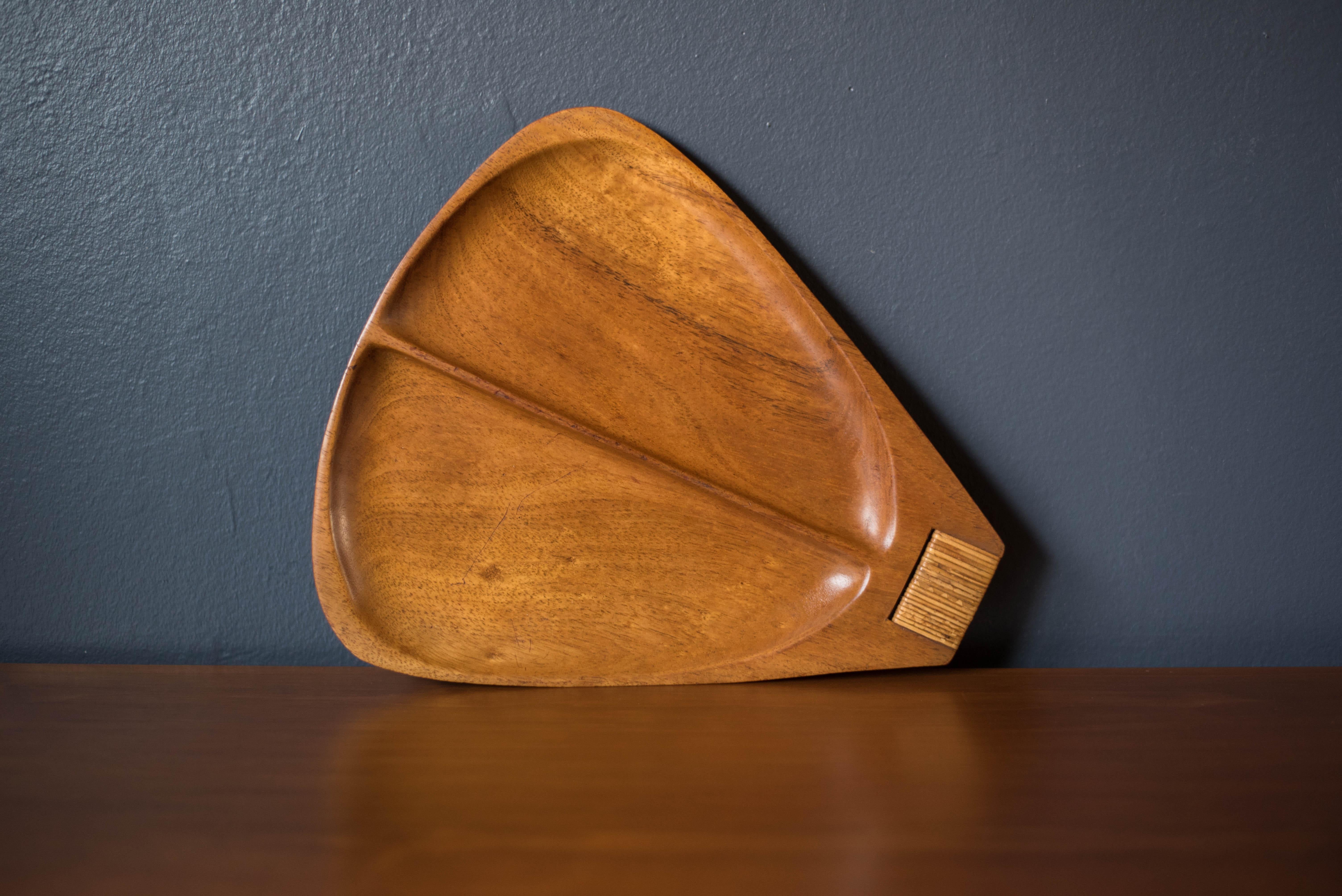 Vintage serving platter tray designed by Arthur Umanoff for Raymor, circa 1960's. This solid piece is made out of Taverneau wood and features a woven reed handle.