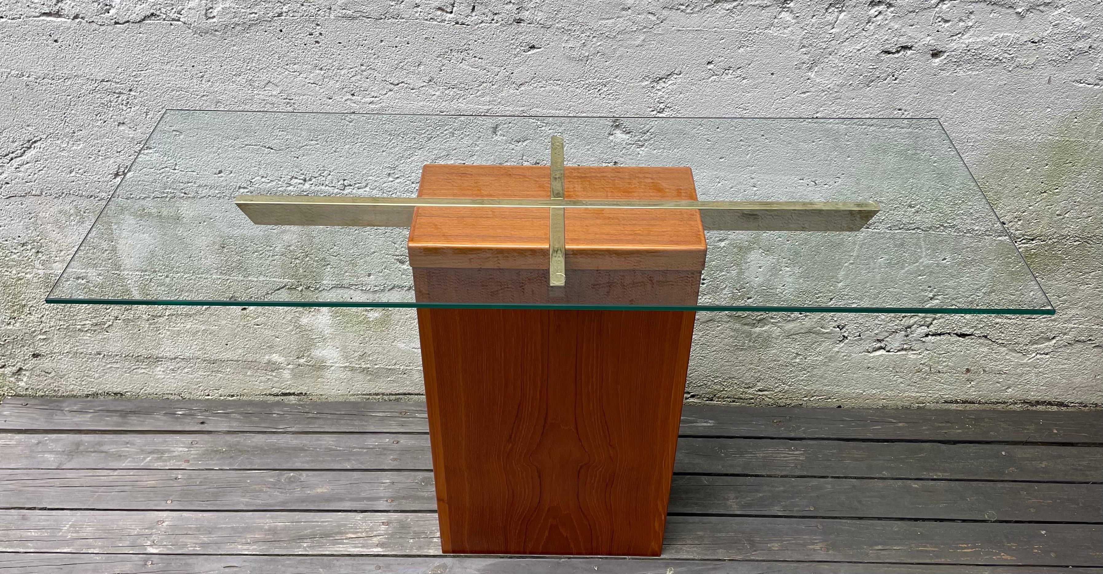 Beautiful Danish modern teak base foyer or console table with polished brass extensions and new 3/8