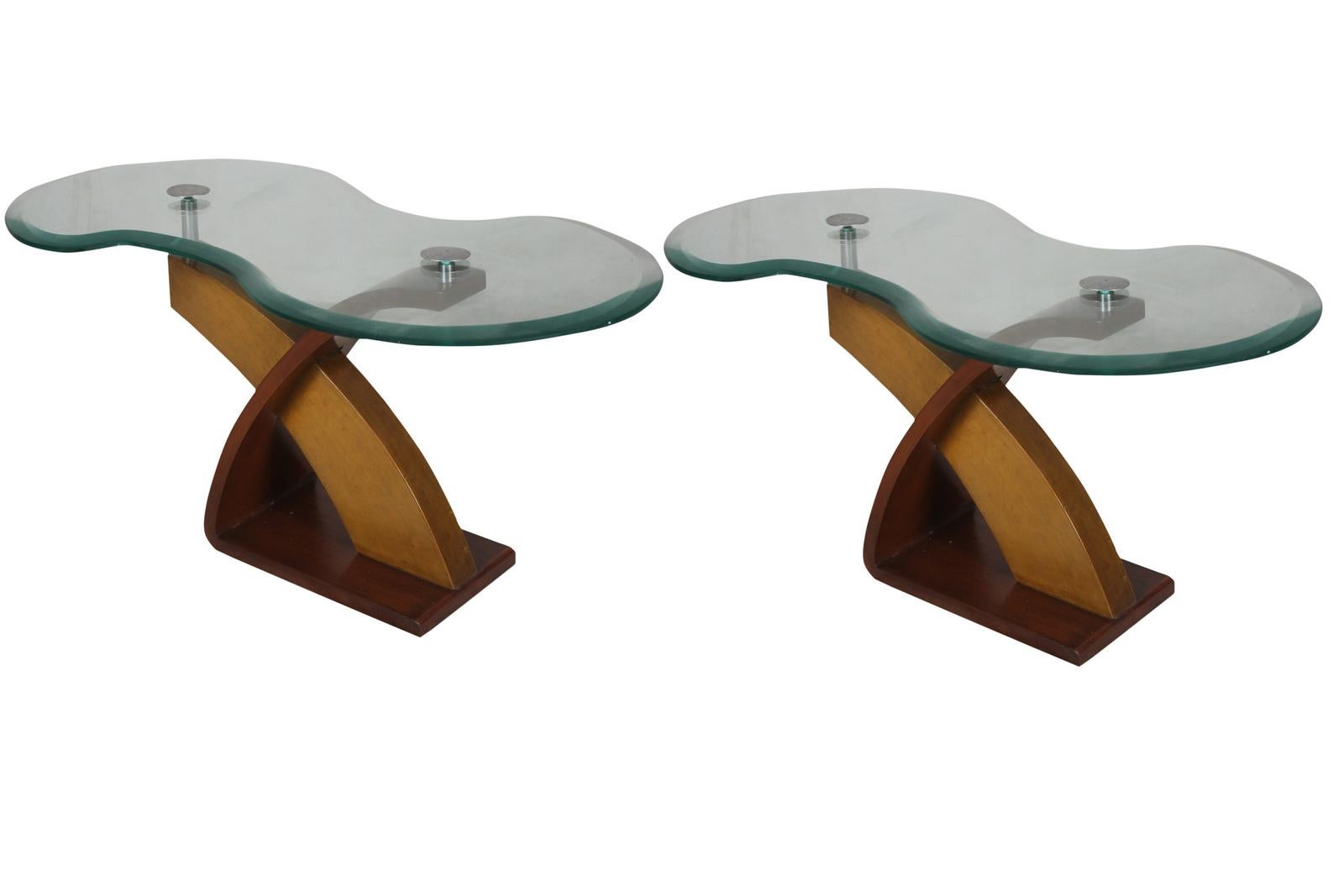 Mid-Century Modern teak and mahogany side or coffee table with chrome hardware.  Glass top with a serpentine shape and beveled edges.