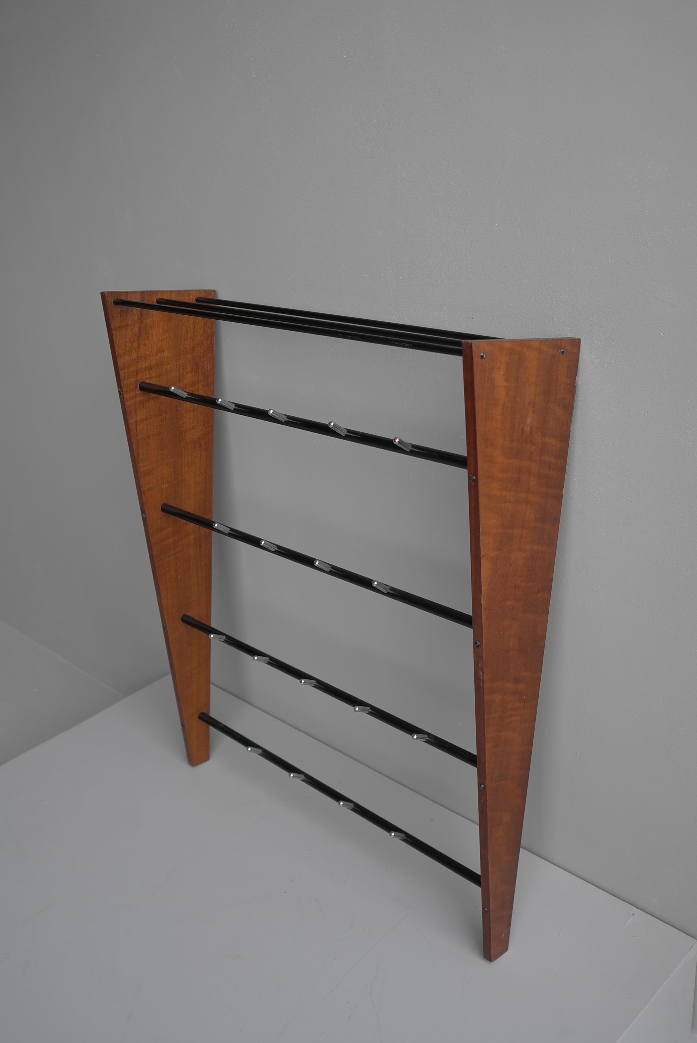 Mid-Century Modern teak and metal wall coat rack, France, 1960s.
Should hang on the wall, mounting material is included.