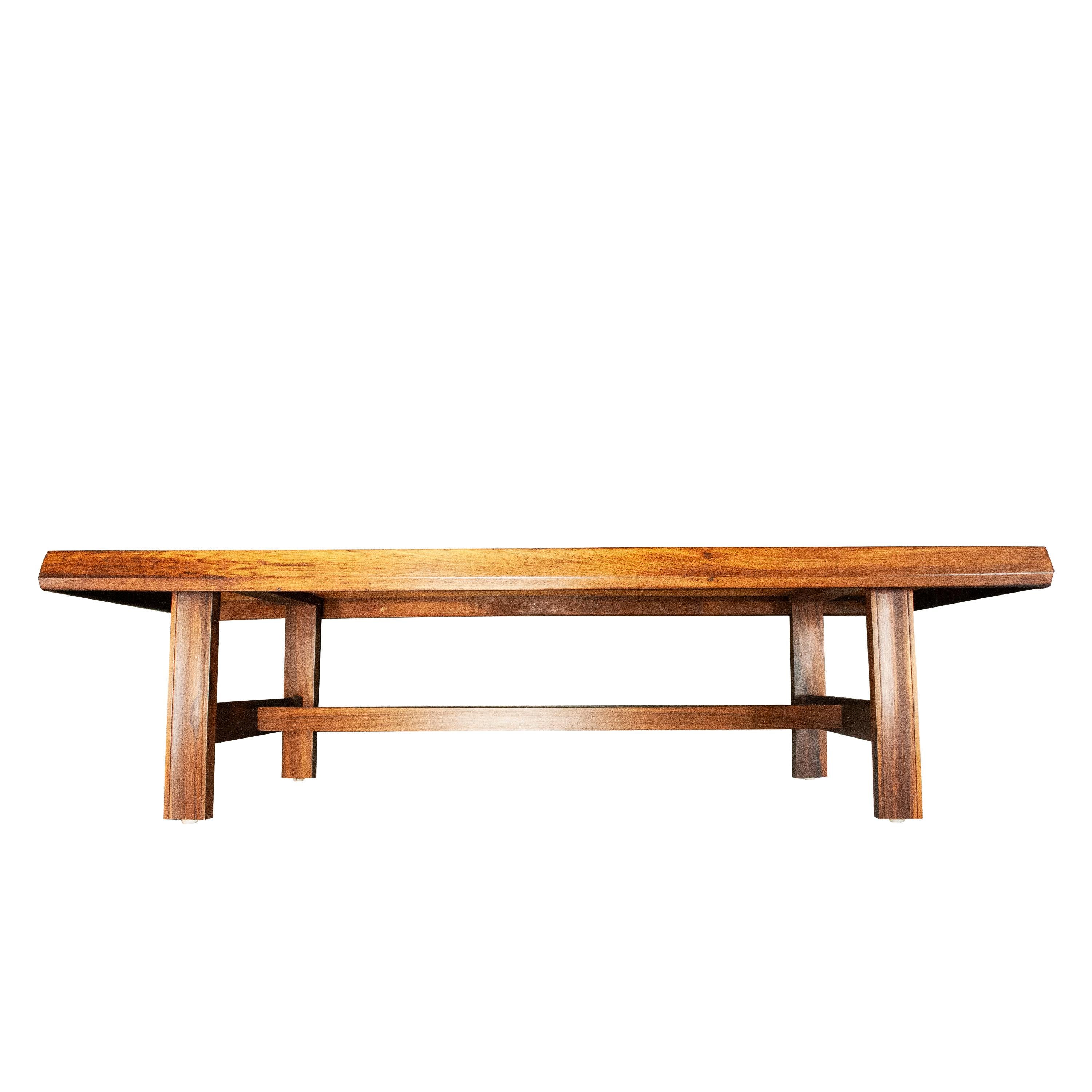 Mid-Century Modern Swedish teak wooden coffee table with carved legs. 

Dimensions: 161 x 71 x44 (H).