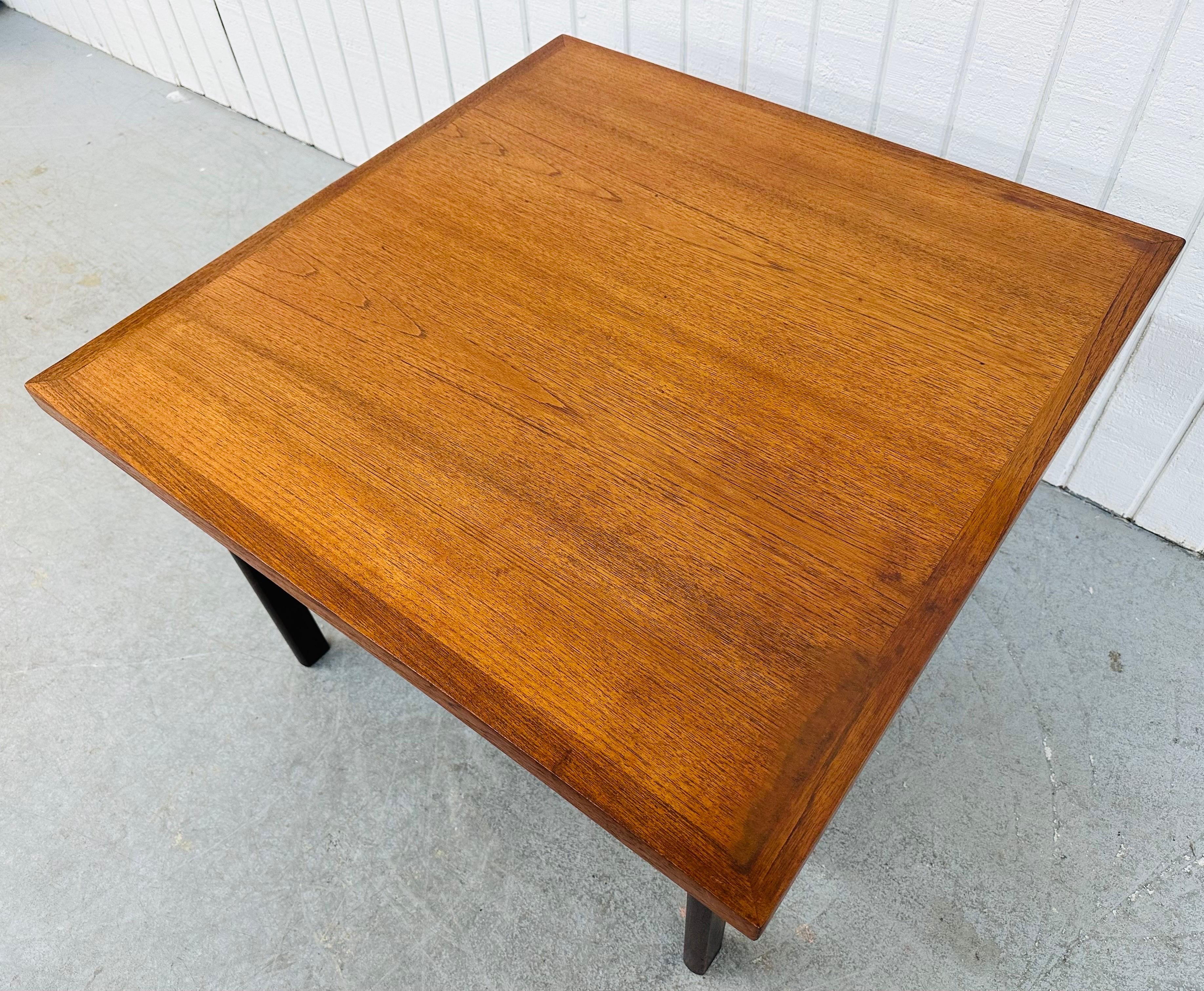 This listing is for a Mid-Century Modern Wegner Style Teak Coffee Table. Featuring a straight line design, bottom magazine shelf, four thick modern legs, and a beautiful teak finish. This is an exceptional combination of quality and design!
