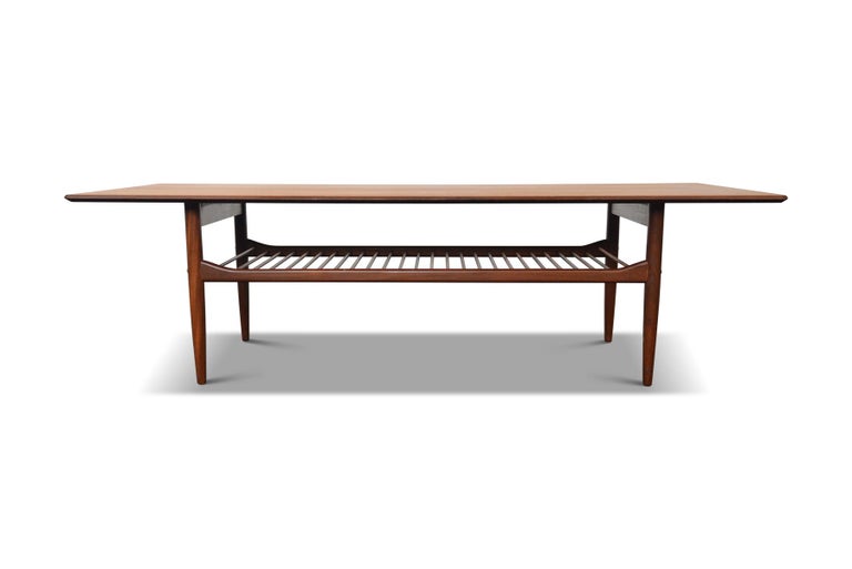 MidCentury Modern Teak Coffee Table with Lower Rack by Ib Kofod Larsen