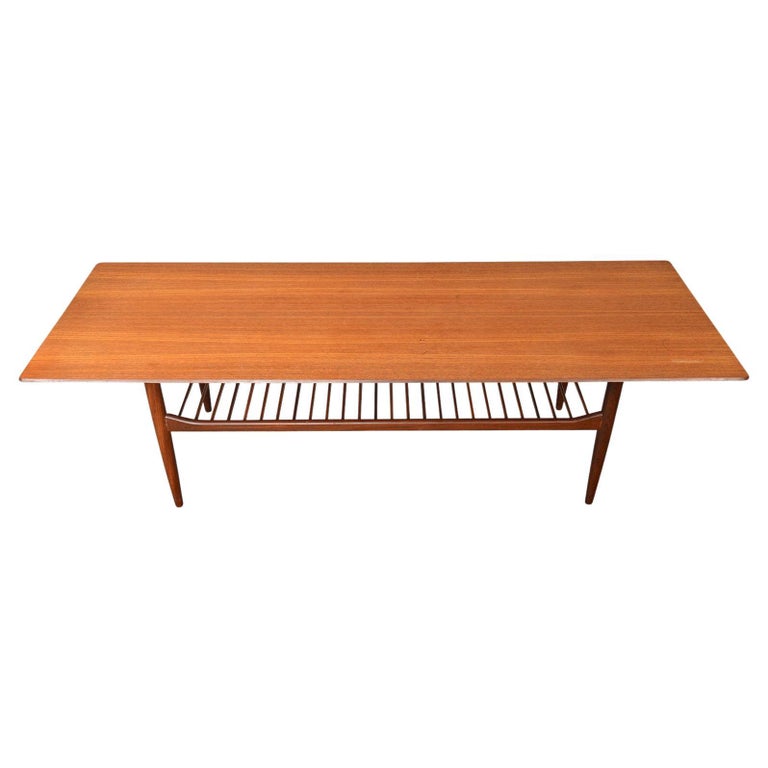 MidCentury Modern Teak Coffee Table with Lower Rack by Ib Kofod Larsen