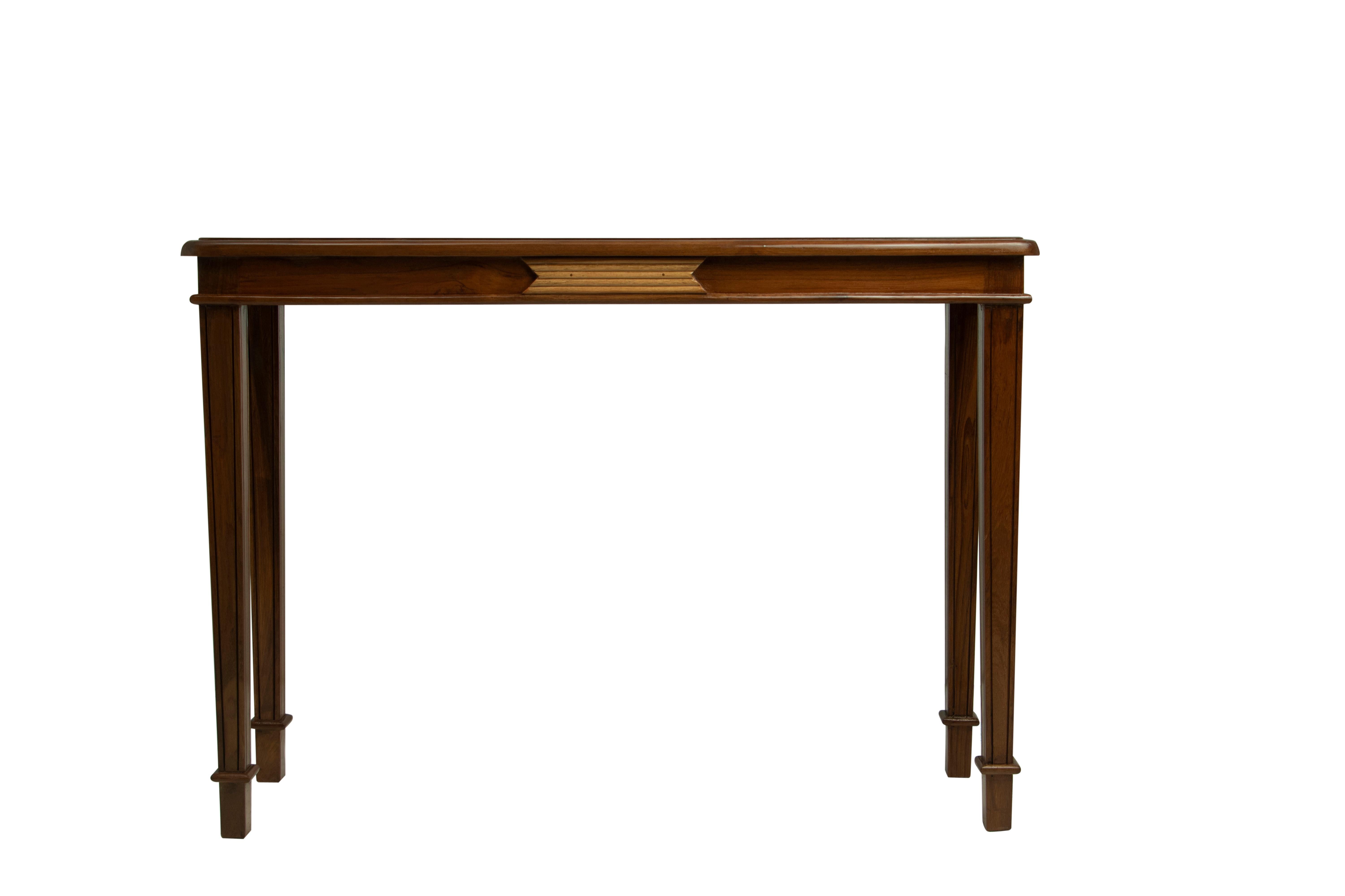 A slim and versatile Mid-Century Modern teak console table, or hall table or even use as a narrow desk.  It features a reeded decorative architectural motif at the front and the two sides in a lighter Burmese teak.  Those three sides have beveled