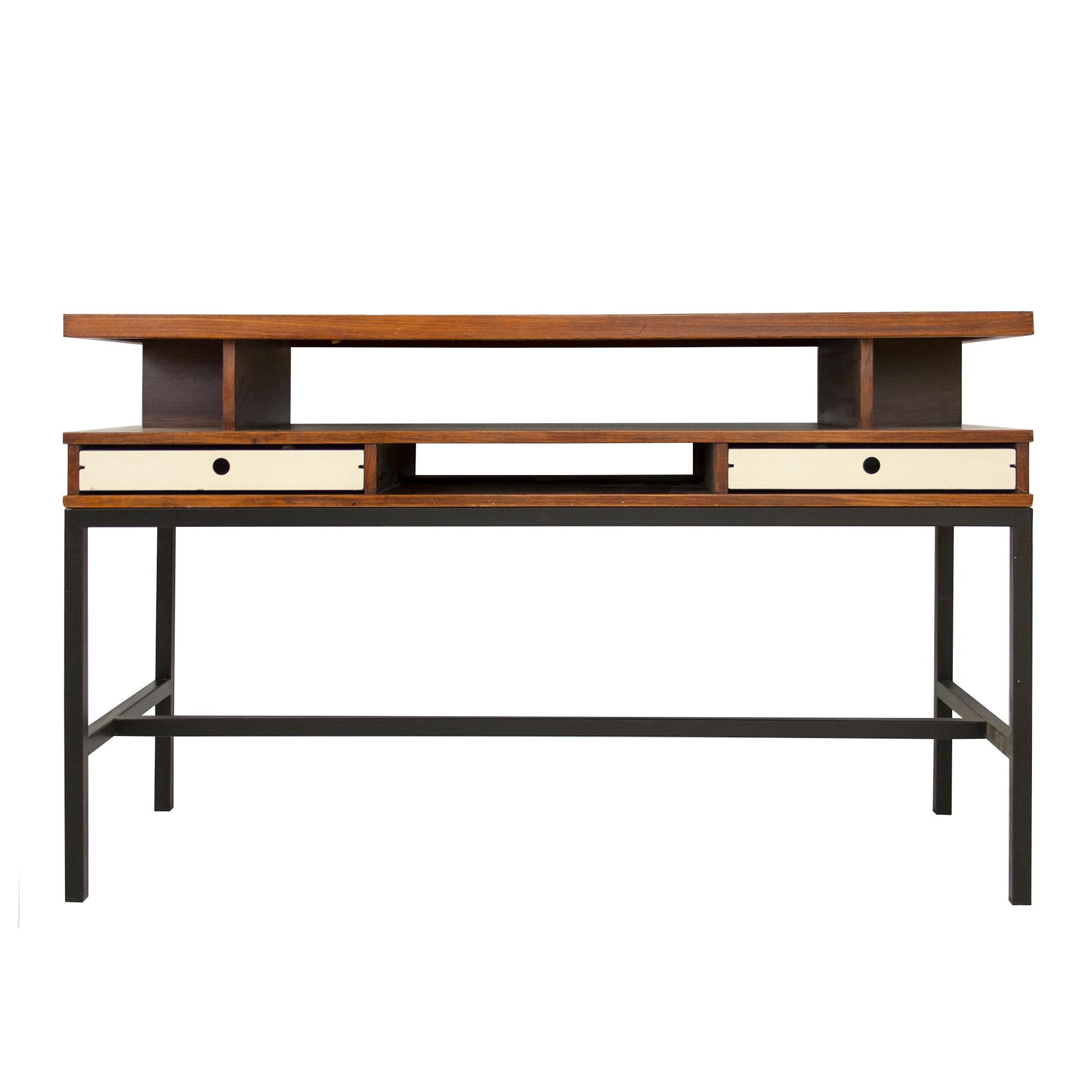 Elegant Italian console table from the mid-20th century composed of a teak wood top with two white lacquered, dual operning sliding drawers over an iron base with black matt lacquered finish. 


