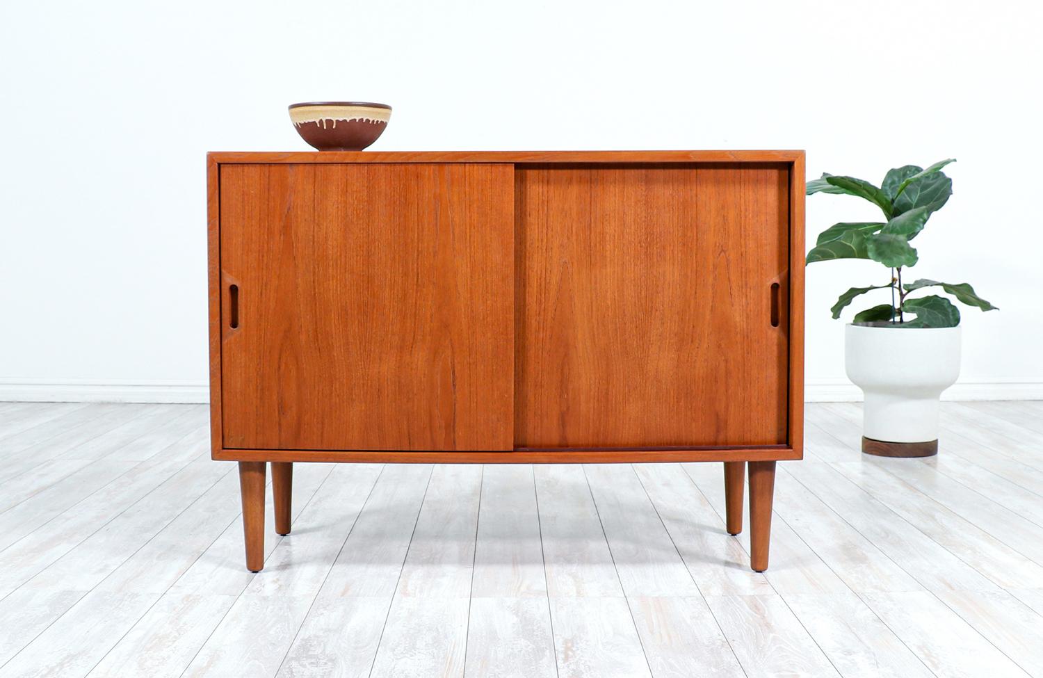 Mid-Century Modern teak credenza by Raymor.