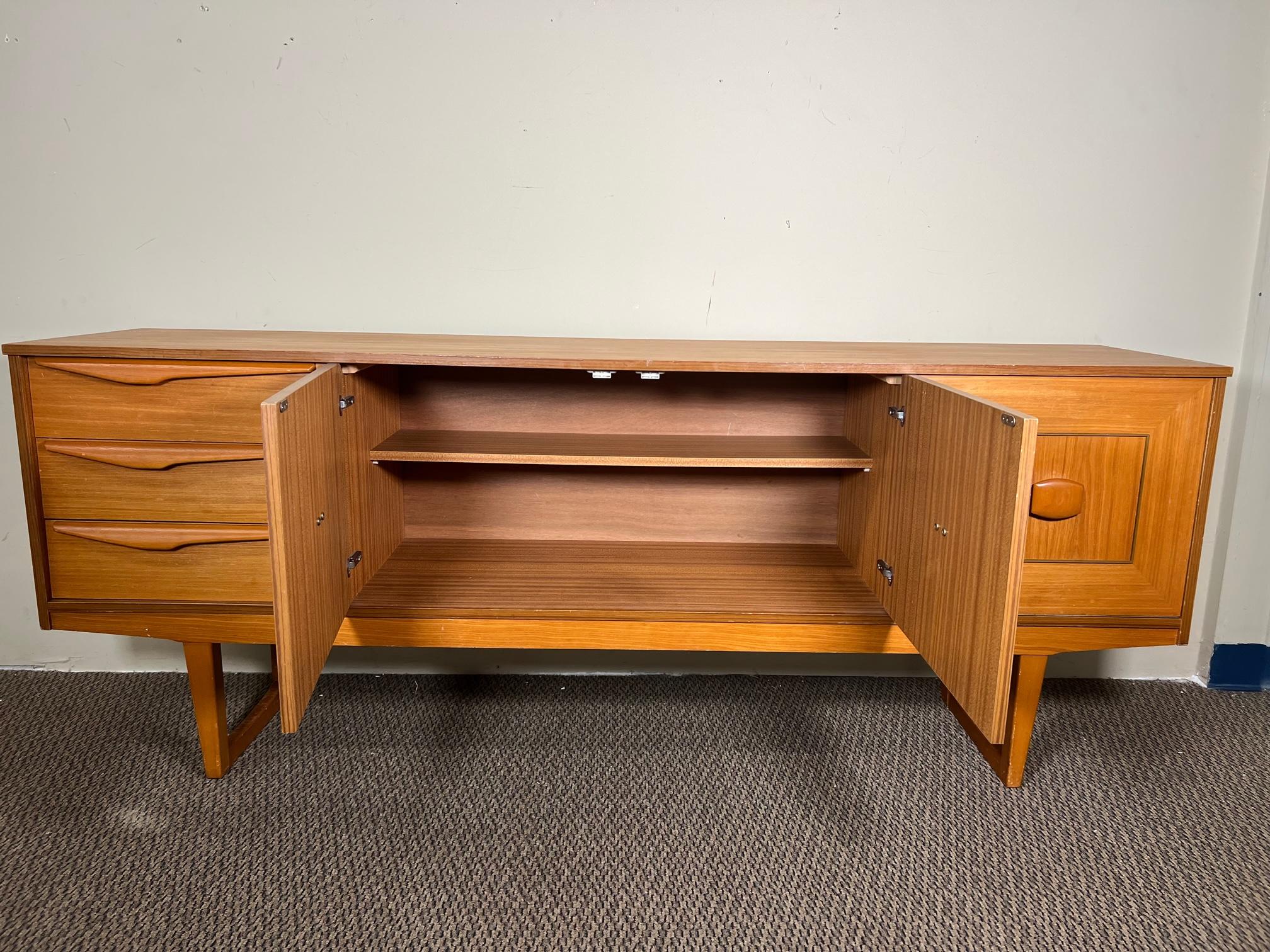 Mid-Century Modern Teak Credenza by Stateroom Made in England Sleigh Legs In Good Condition In Atlanta, GA
