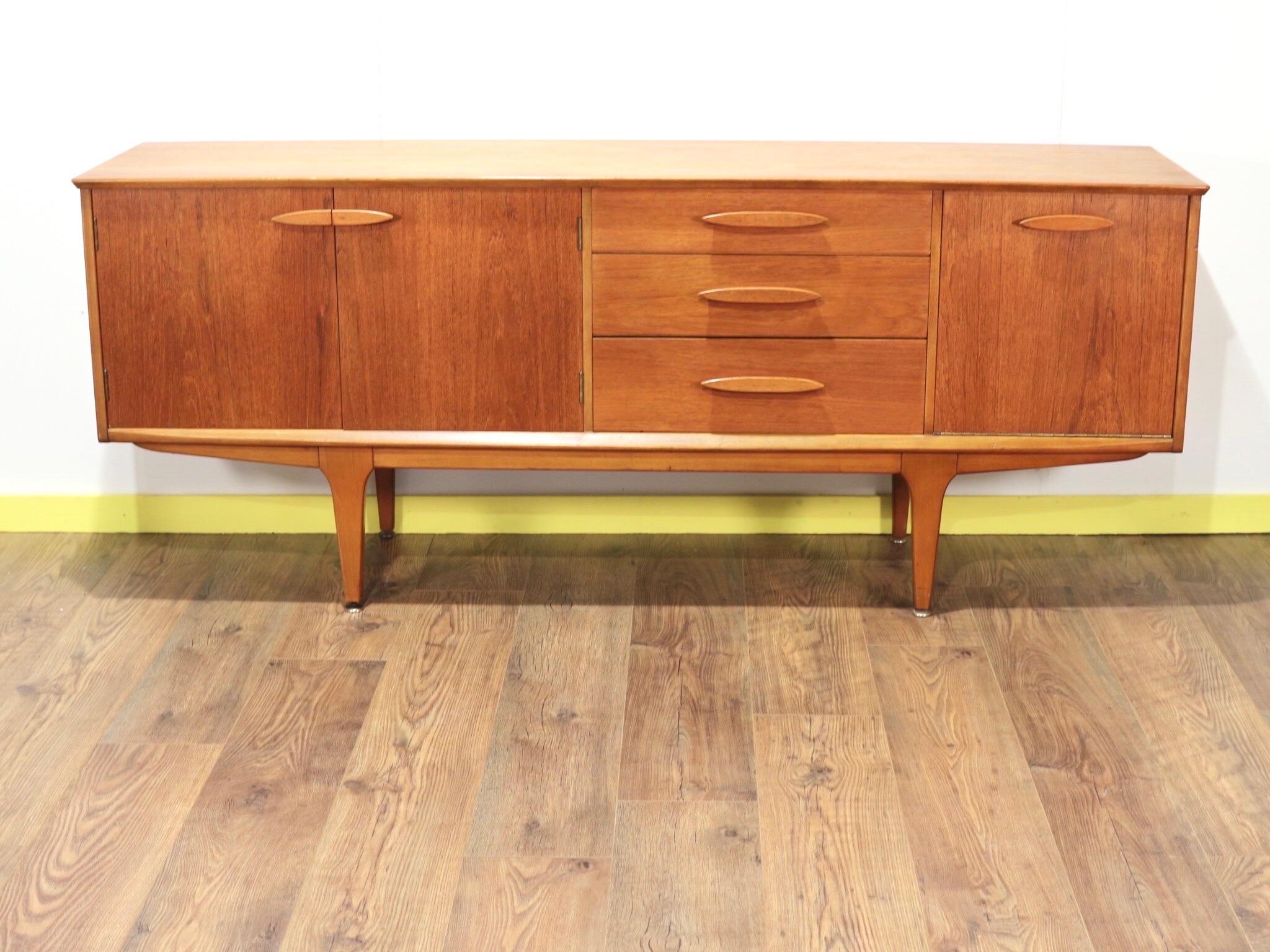 This gorgeous mid century modern credenza by Jentique is a fantastic piece of furniture. It oozes danish style and has a fantastic grain in the wood to make it stand out for the crowd.

With plenty of storage this is a really wonderful piece.