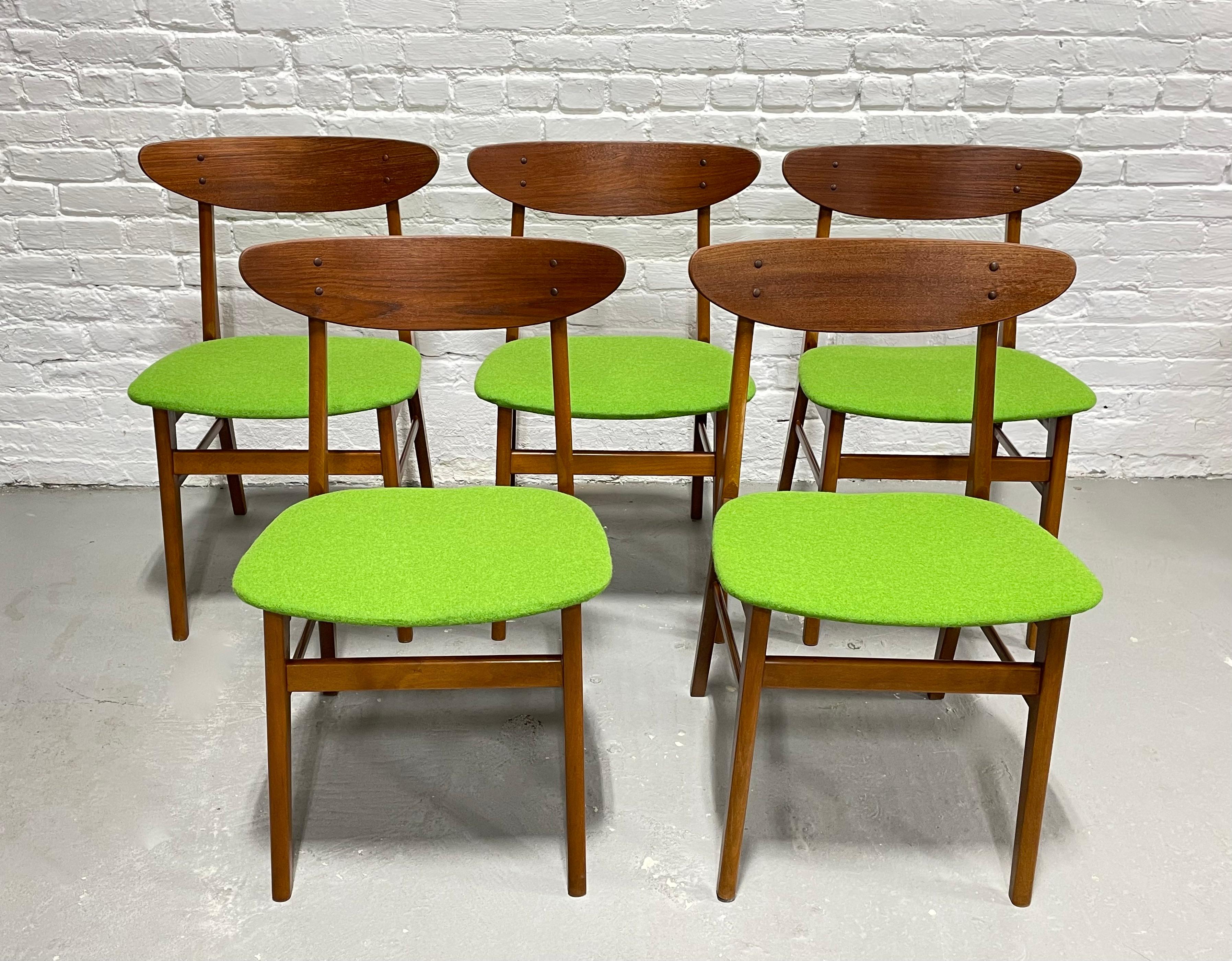 Set of Five Mid Century Modern Teak Danish Dining Chairs by Farstrup Mobler, Made in Denmark, c. 1960's.  These chairs are showstoppers from every angle, from the curved backrest to the pristine apple green wool upholstery. The stunning teak wood