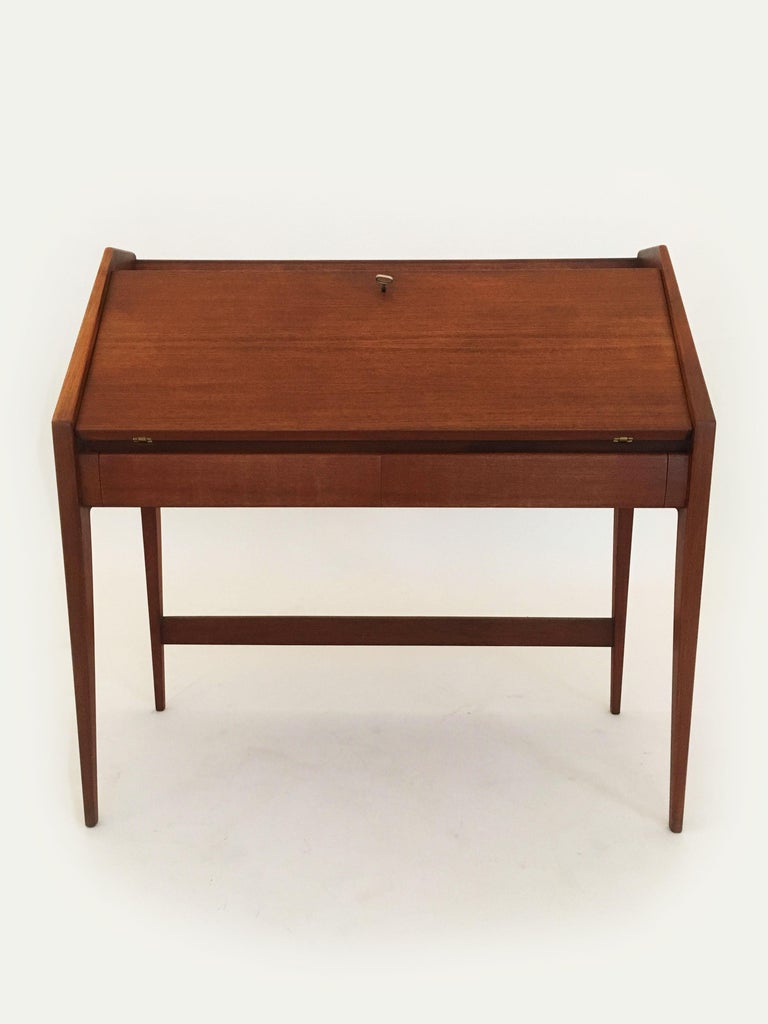Mid-Century Modern teak desk, writing table by Walter Wirz for Wilhelm Renz, Germany, 1950s.