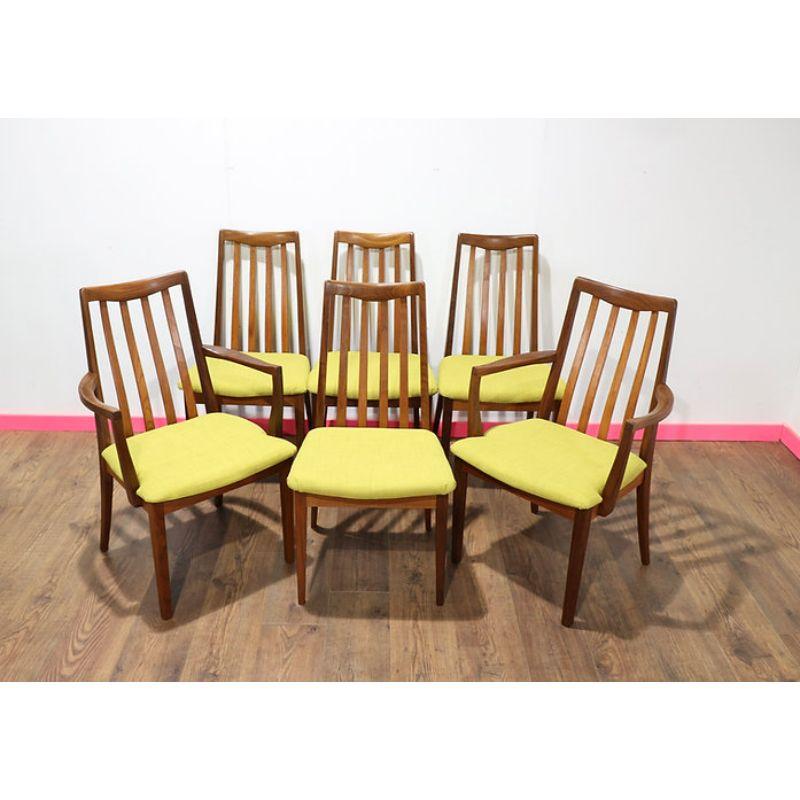 A gorgeous set of 6 G Plan teak framed dining chairs from their Brasillia range including 2 carver chairs. These fabulous chairs have had the seat pads recently upholstored to give them a really striking look. They would look great in any dining