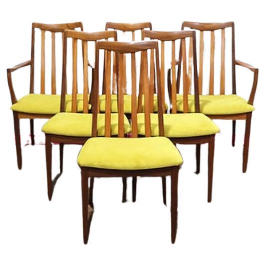 A gorgeous set of 6 G Plan teak framed dining chairs from their Brasillia range including 2 carver chairs. These fabulous chairs have had the seat pads recently upholstored to give them a really striking look. They would look great in any dining