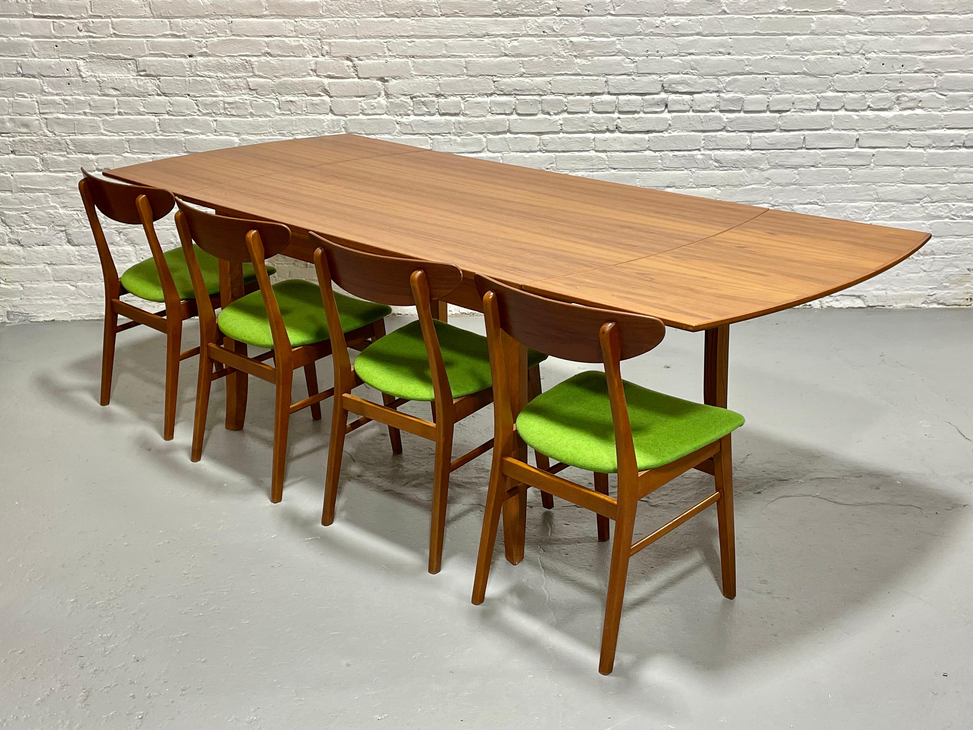 Mid Century MODERN Teak DINING TABLE + hidden leaves, c. 1960's In Good Condition In Weehawken, NJ