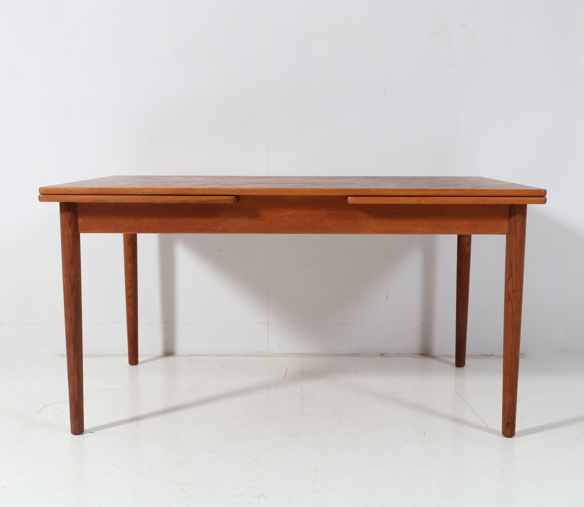 Danish  Mid-Century Modern Teak Extendable Dining Room Table Mo. 215 by Farstrup, 1960s For Sale
