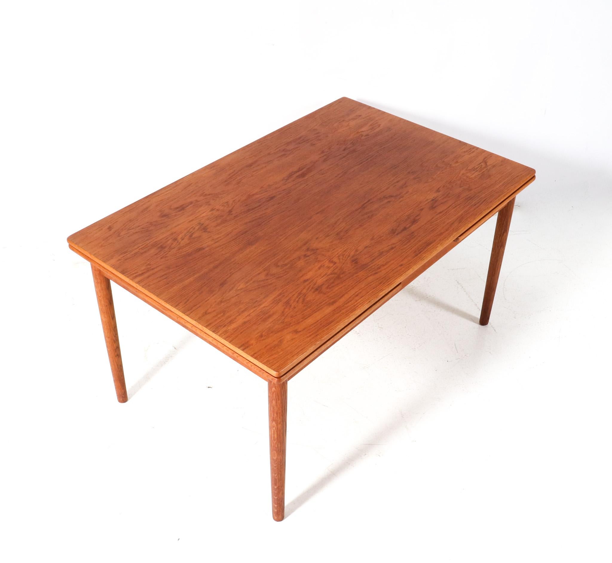 Mid-20th Century  Mid-Century Modern Teak Extendable Dining Room Table Mo. 215 by Farstrup, 1960s For Sale
