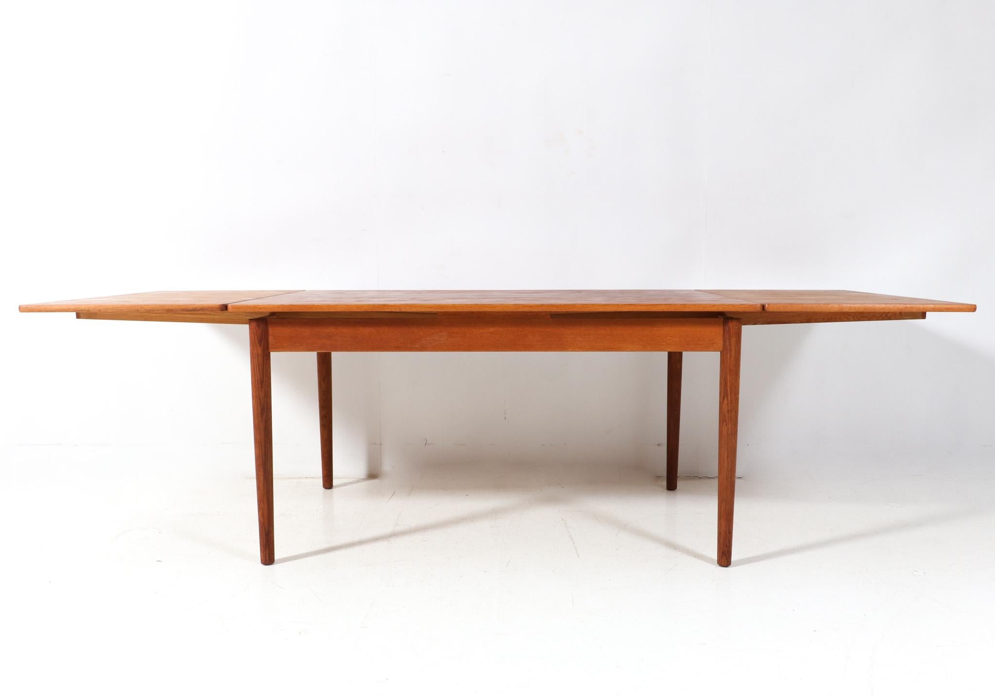  Mid-Century Modern Teak Extendable Dining Room Table Mo. 215 by Farstrup, 1960s For Sale 1