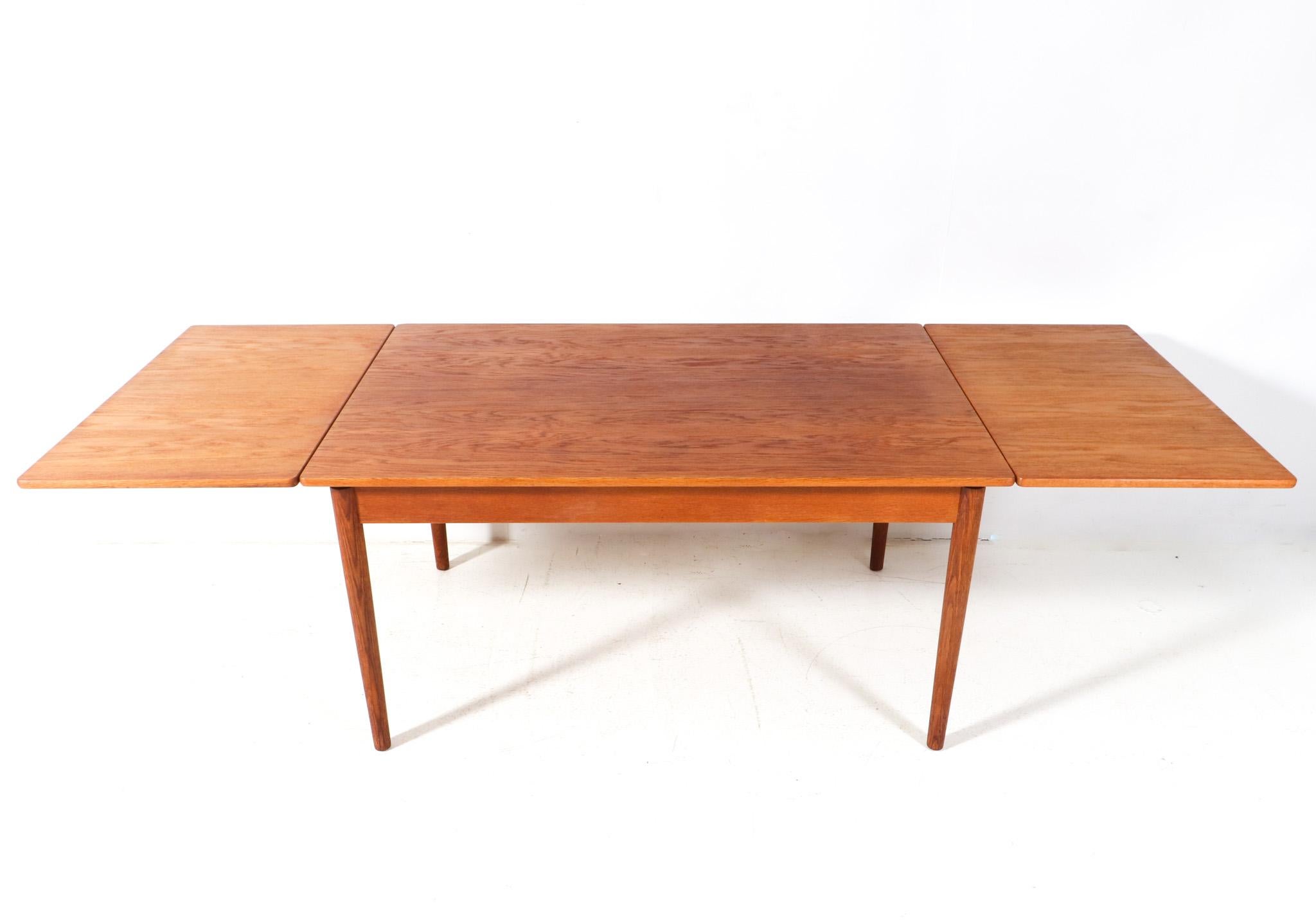  Mid-Century Modern Teak Extendable Dining Room Table Mo. 215 by Farstrup, 1960s For Sale 2