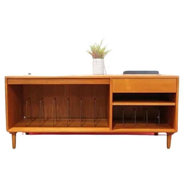 This gorgeous media/record cabinet is the perfect cabinet for your vinyl storage needs.  Made my G Plan  in the 1960's  featuring a beutiful grain and torpedo legs which have been added.  This cabinet will look fantastic in any setting, a true