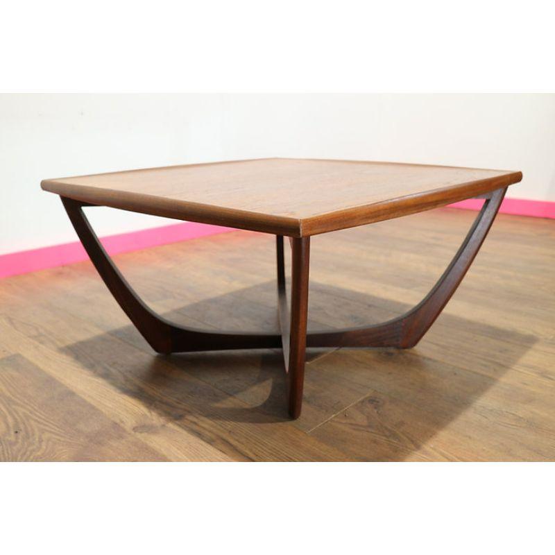 This Stunning Mid Century coffee table was manufactured by renowned British furniture maker G Plan in the 1960s.  Made from teak the crossed sculpted legs make it a really eye catching piece that would look fabulous in any room.  

In excellent