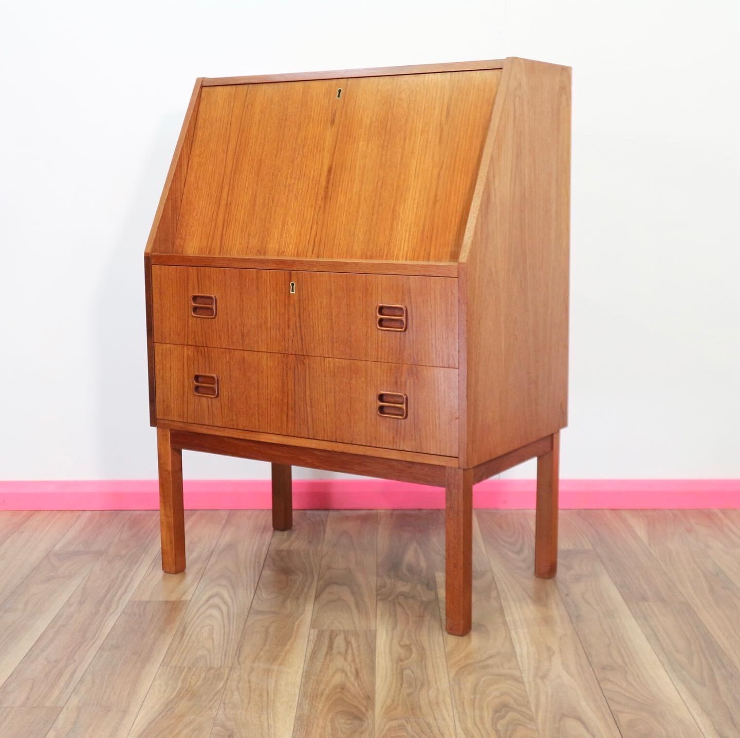 This gorgeous bureau by Gunnar Nielsen of Denmark is a fantastic piece as well as being pleaseing on the eye it is a useful piece for working at. Featuring a drop down desk and plenty of storage it would be great for home working.