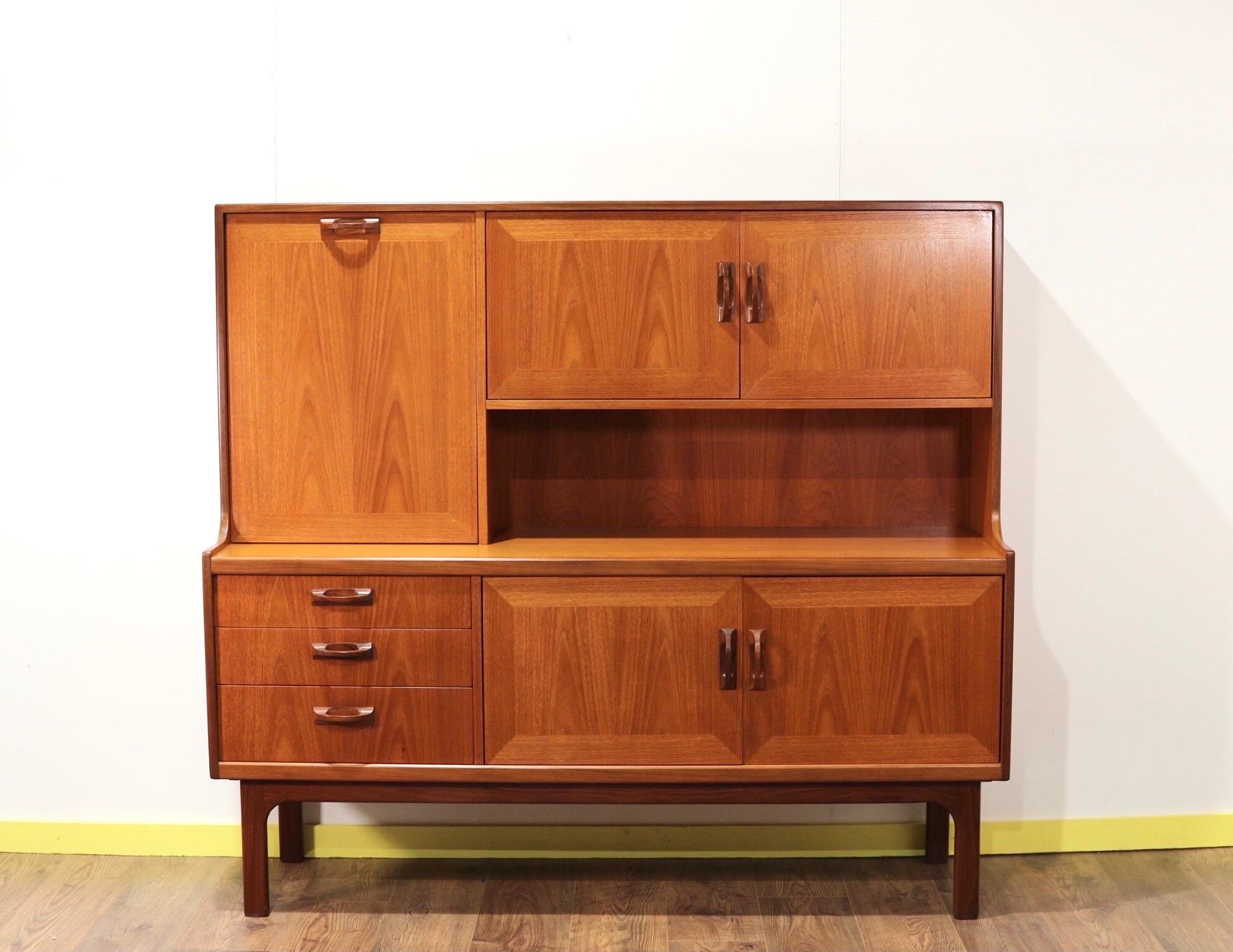 This delightful credenza was designed and produced by British furniture manufacturing company G-Plan in the 1960's
G Plan - E. Gomme Ltd was based in High Wycombe, England, a major center of British furniture manufacturing. The company was revered