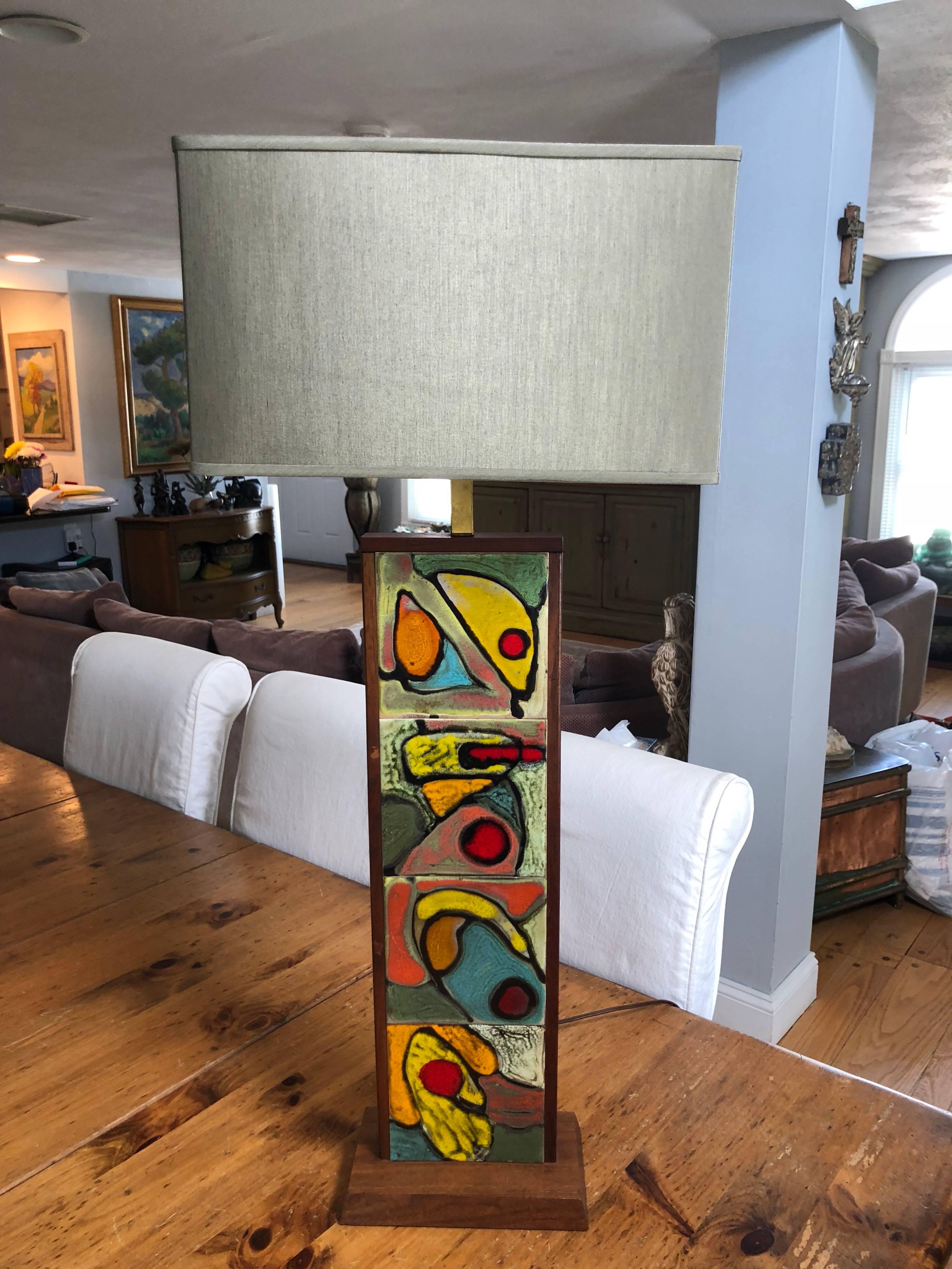 Mid-Century Modern teak lamp attributed to Harris Strong. Amazing tile work and incredible colors.