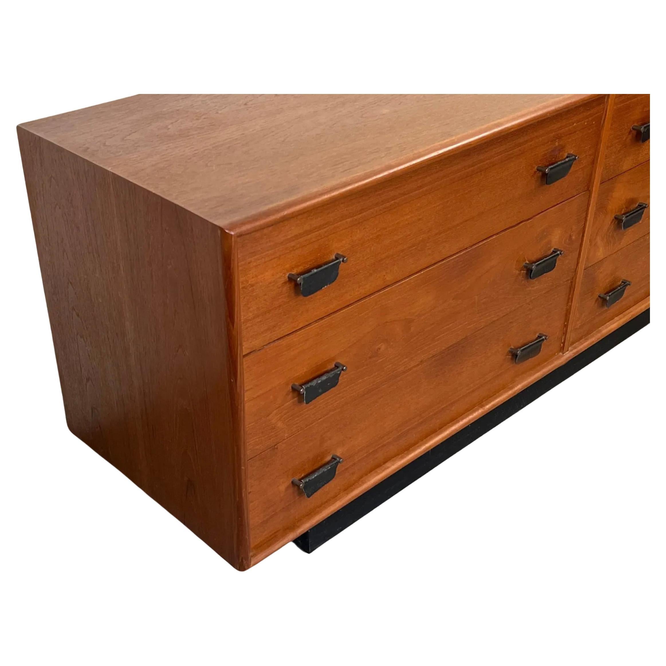 Danish Mid Century Modern Teak low 6 drawer dresser with leather pulls and plinth base For Sale