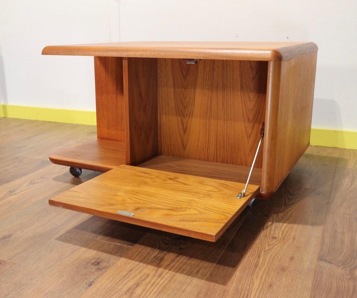 Big bold and beautiful solid teak coffee table with different storage options on both sides of the piece. This beautiful little table by British cabinet maker Meredew is a versatile table and would look great in any space.

 

Dims

W29 D24