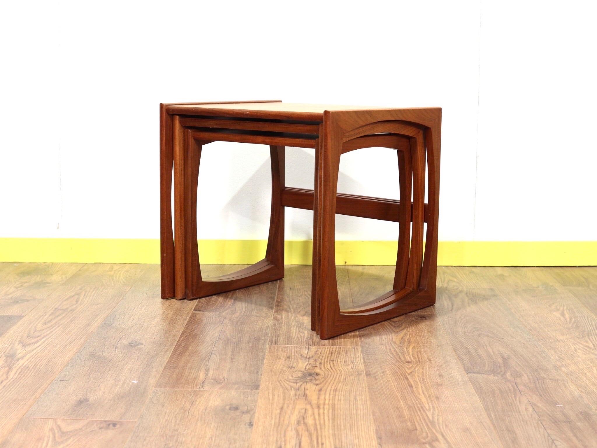 Set of 3 nesting tables in the classic style by G-Plan are part of the quadrille range with teak tops and solid teak framework the tables are in great original condition.

 

Dimensions

Large Table

Cms - W53.5 D43 H49

Inches W21 D17