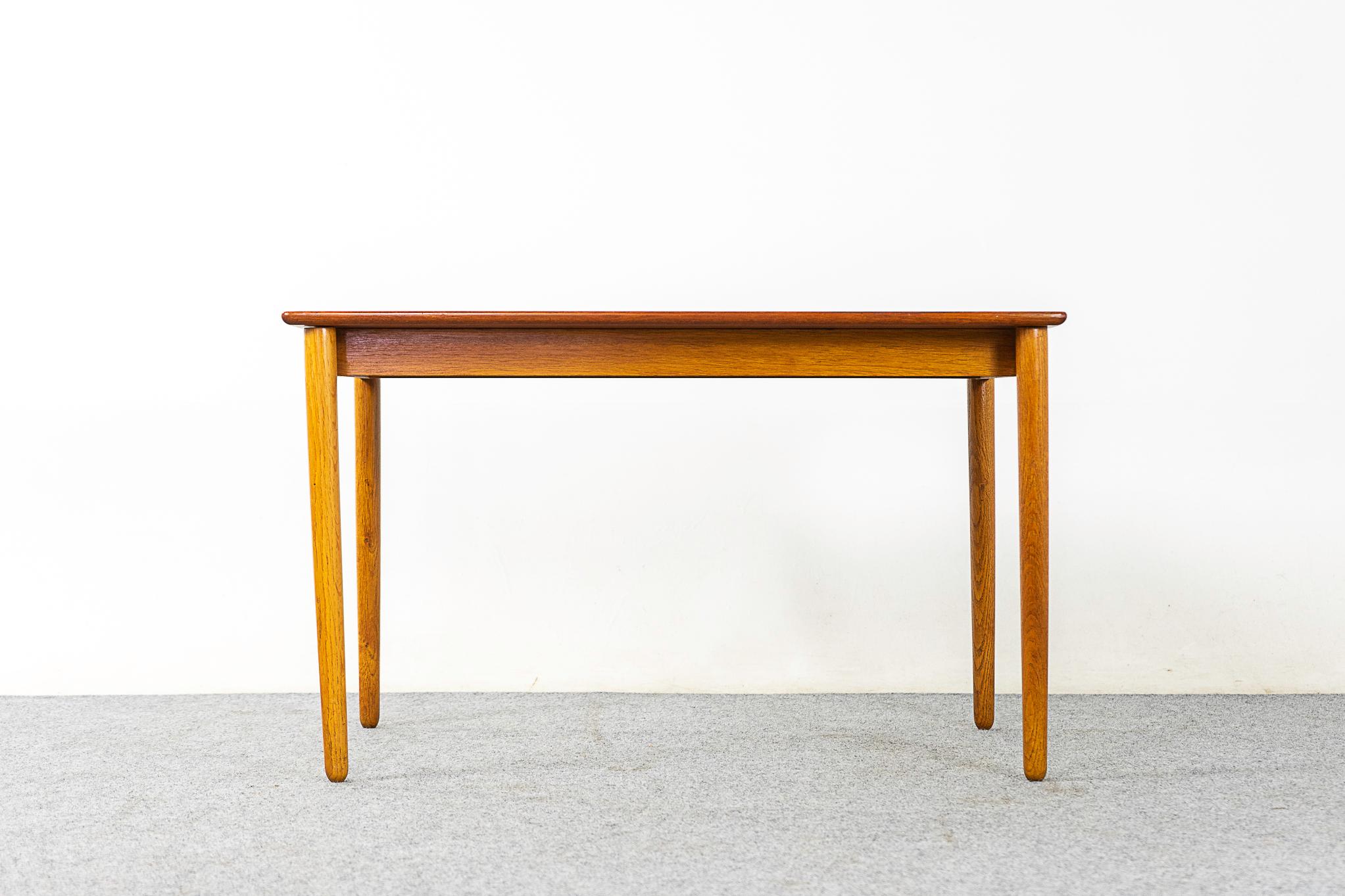 Teak & oak Danish coffee table, circa 1960. Solid teak top with contrasting oak base. Very unusual dimensions!

Please inquire for remote and international shipping rates.