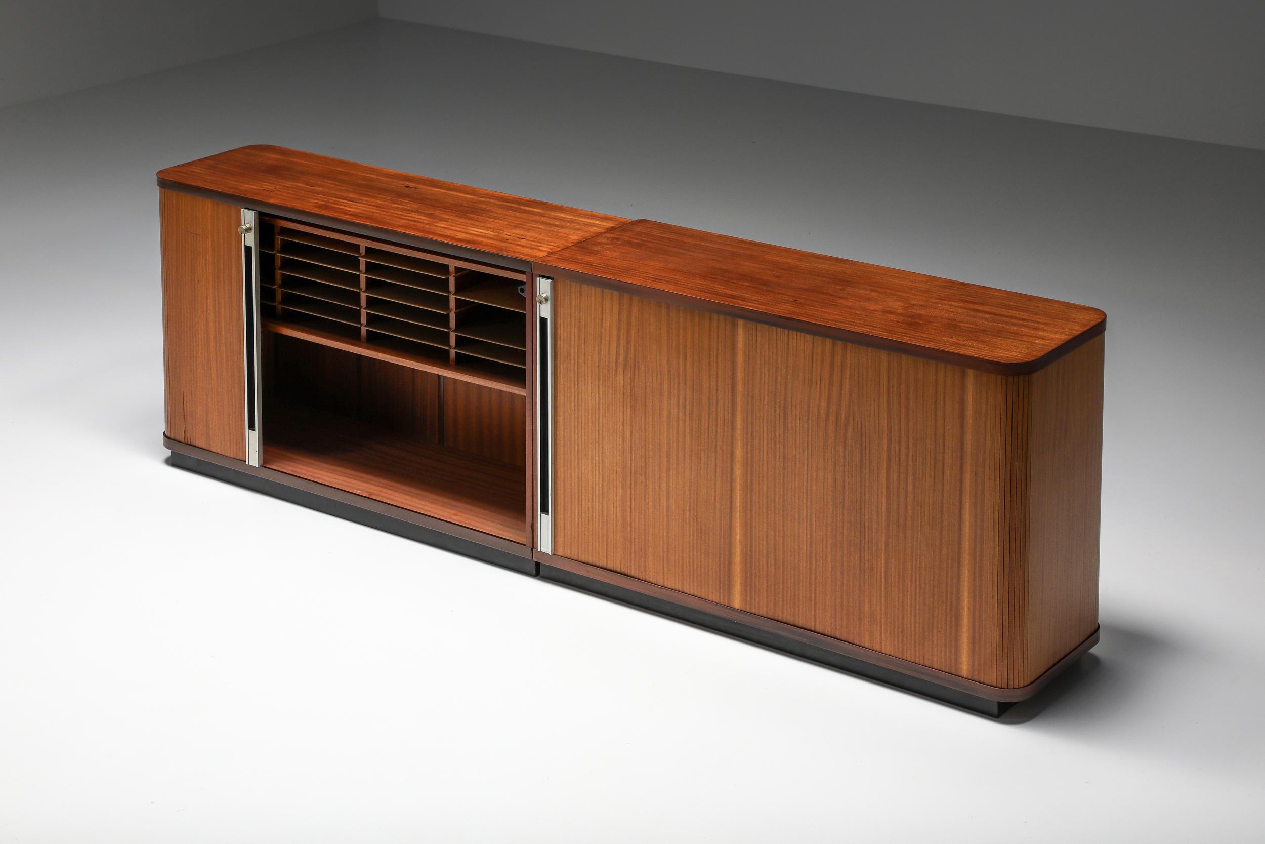 Knoll; Cabinet; Credenza; Sideboard: Teak; Roomdivider; Storage unit; Italian Design;

Florence Knoll style set of two teak office sideboards with tambour doors. Can be used as room dividers since the back is also finished in teak. The cabinets