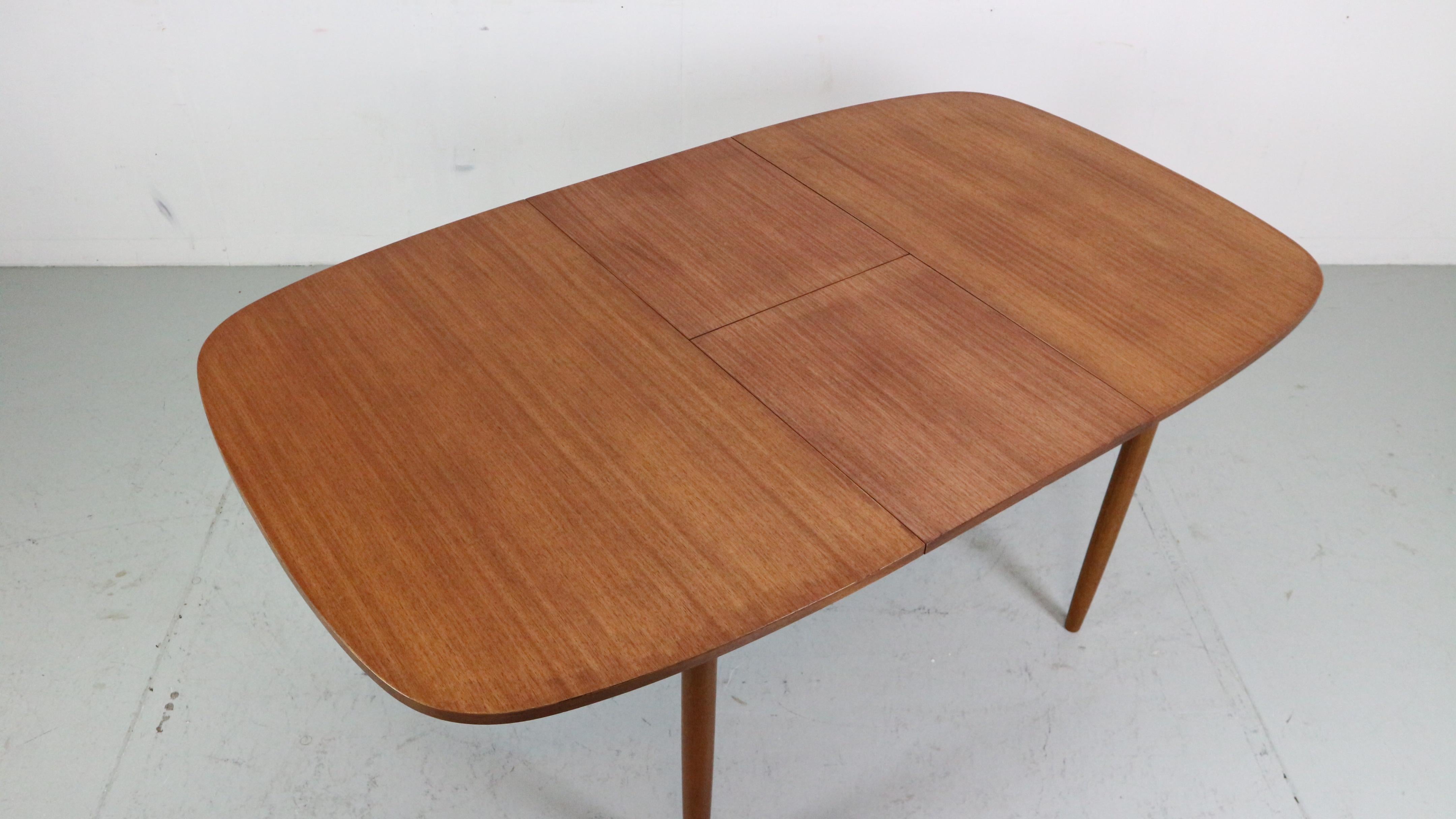 Mid-20th Century Mid- Century Modern Teak OvalExtendable Dinning Table By G Plan, 1960's For Sale