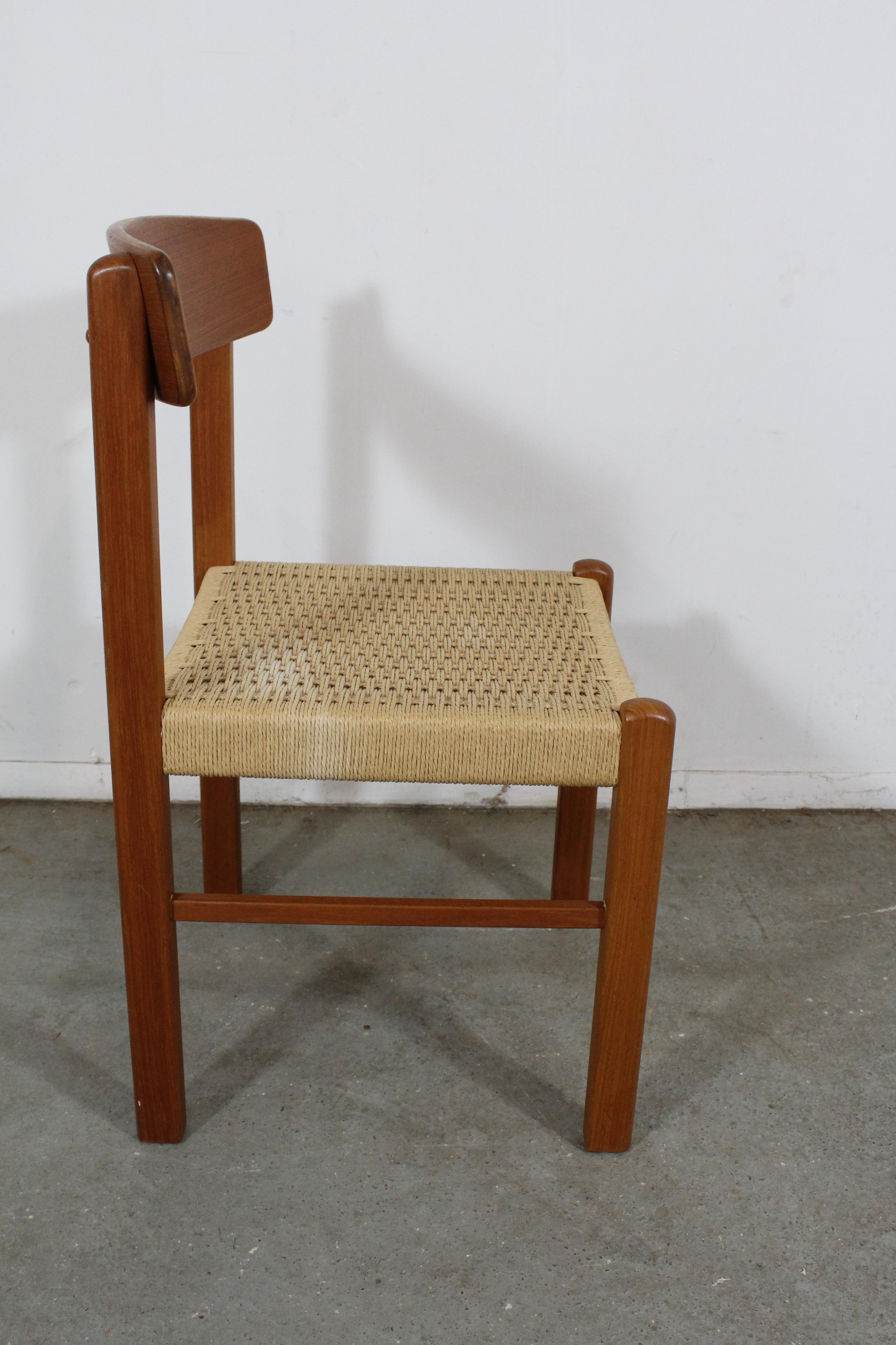 Mid-Century Modern teak rope woven side or desk chair

What a find. Offered is a Mid-Century Modern teak side chair. The rope is intact. It is in good, structurally sound condition, showing some age wear with surface scratches throughout. It is