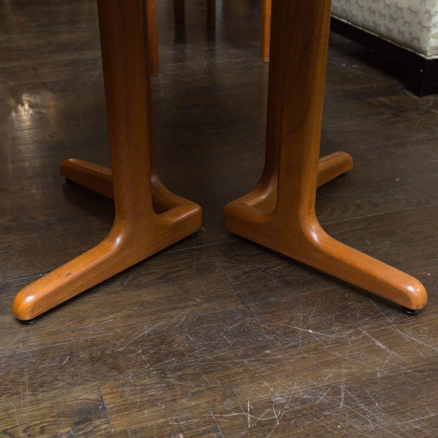 Great Danish modern table that seats 4 to 6. Newly refinished and ready for another 30 years. Table with leave measures 64