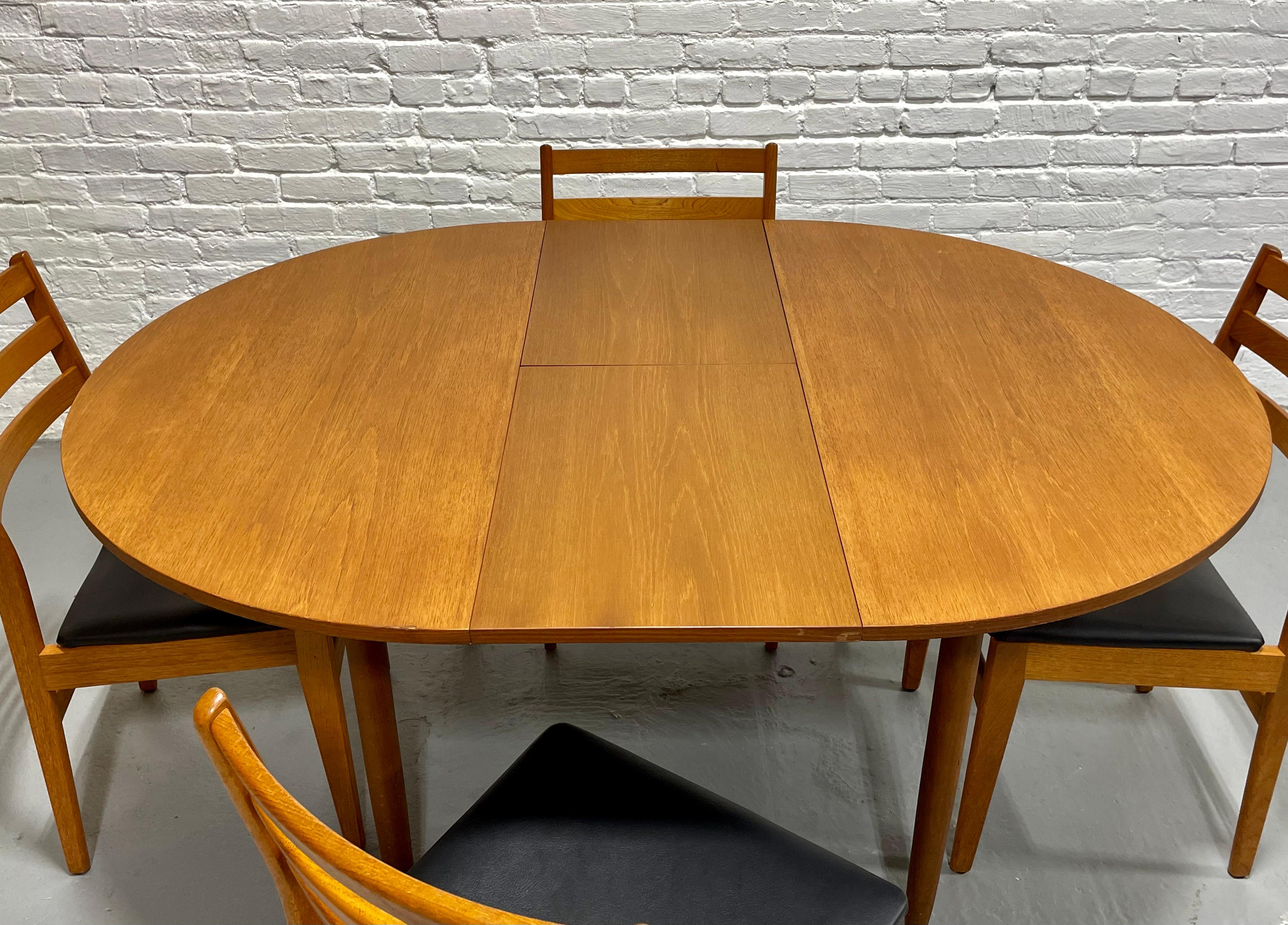 Mid Century MODERN Teak ROUND to OVAL Dining Table, Made in Denmark. c. 1960s 6
