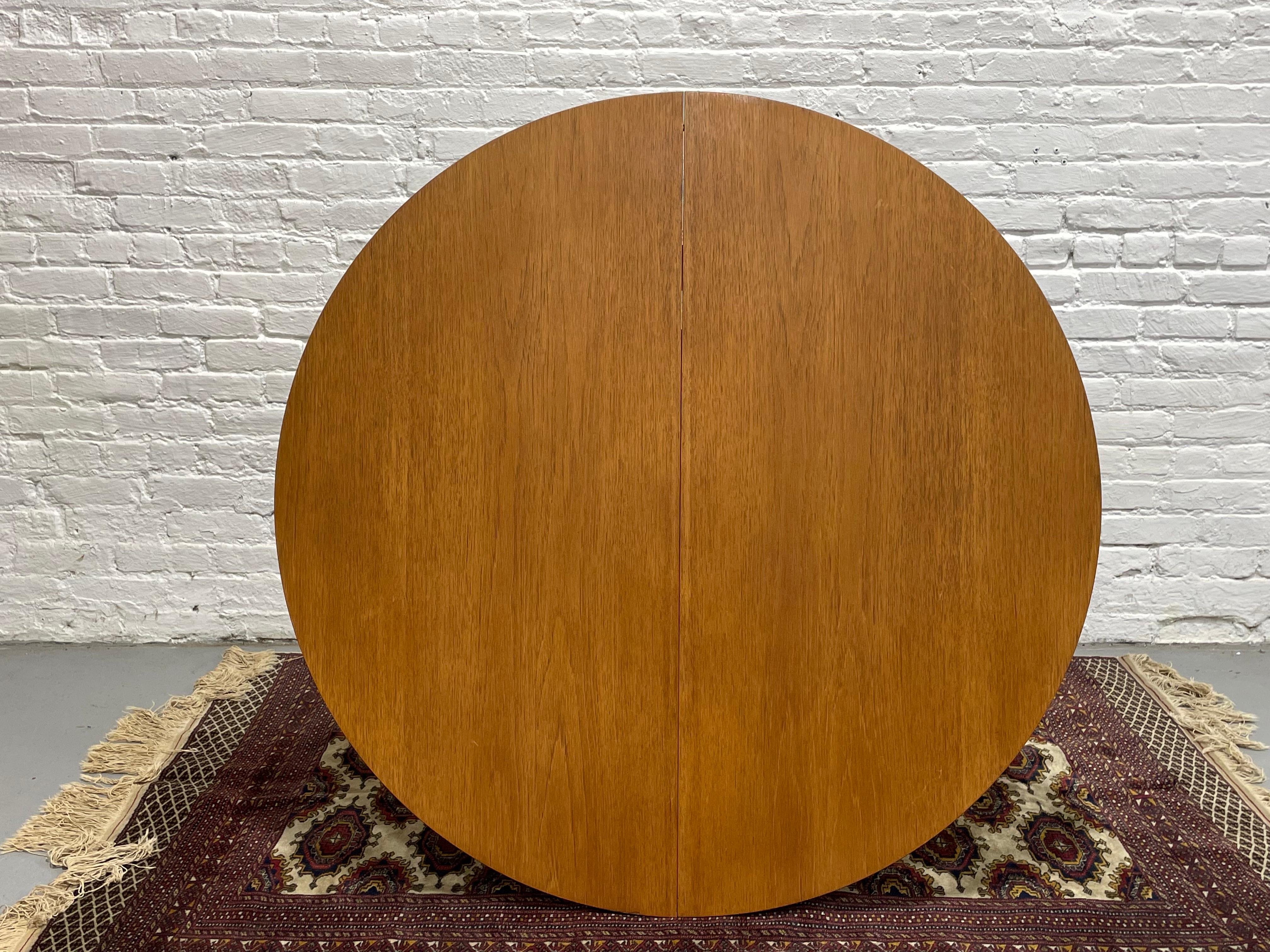 Mid Century MODERN Teak ROUND to OVAL Dining Table, Made in Denmark. c. 1960s 8