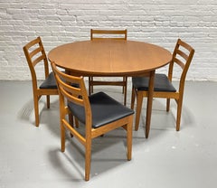 Mid Century MODERN Teak ROUND to OVAL Dining Table, Made in Denmark. c. 1960s