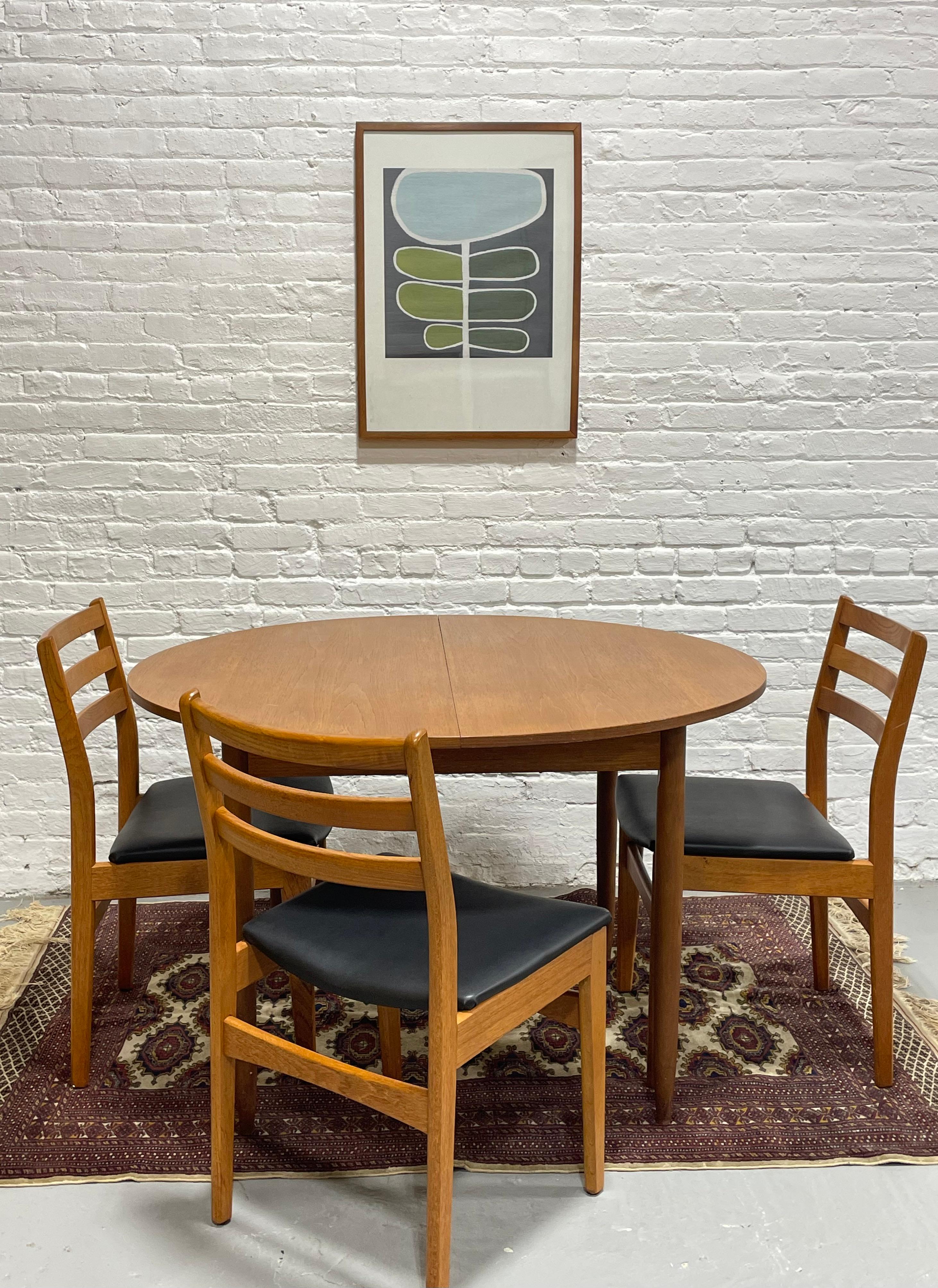Mid-Century Modern Mid Century MODERN Teak ROUND to OVAL Dining Table, Made in Denmark. c. 1960s