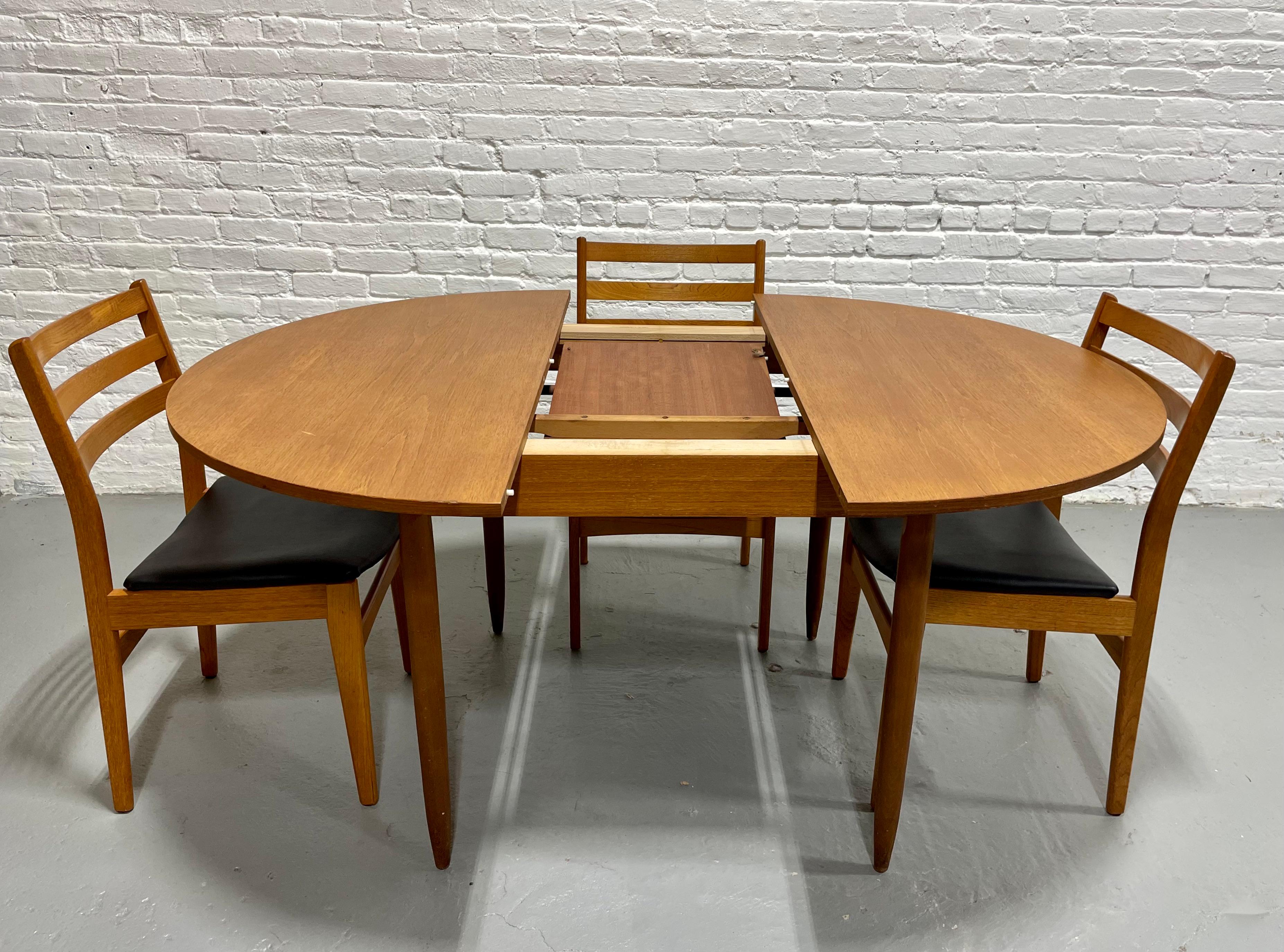 Mid-20th Century Mid Century MODERN Teak ROUND to OVAL Dining Table, Made in Denmark. c. 1960s