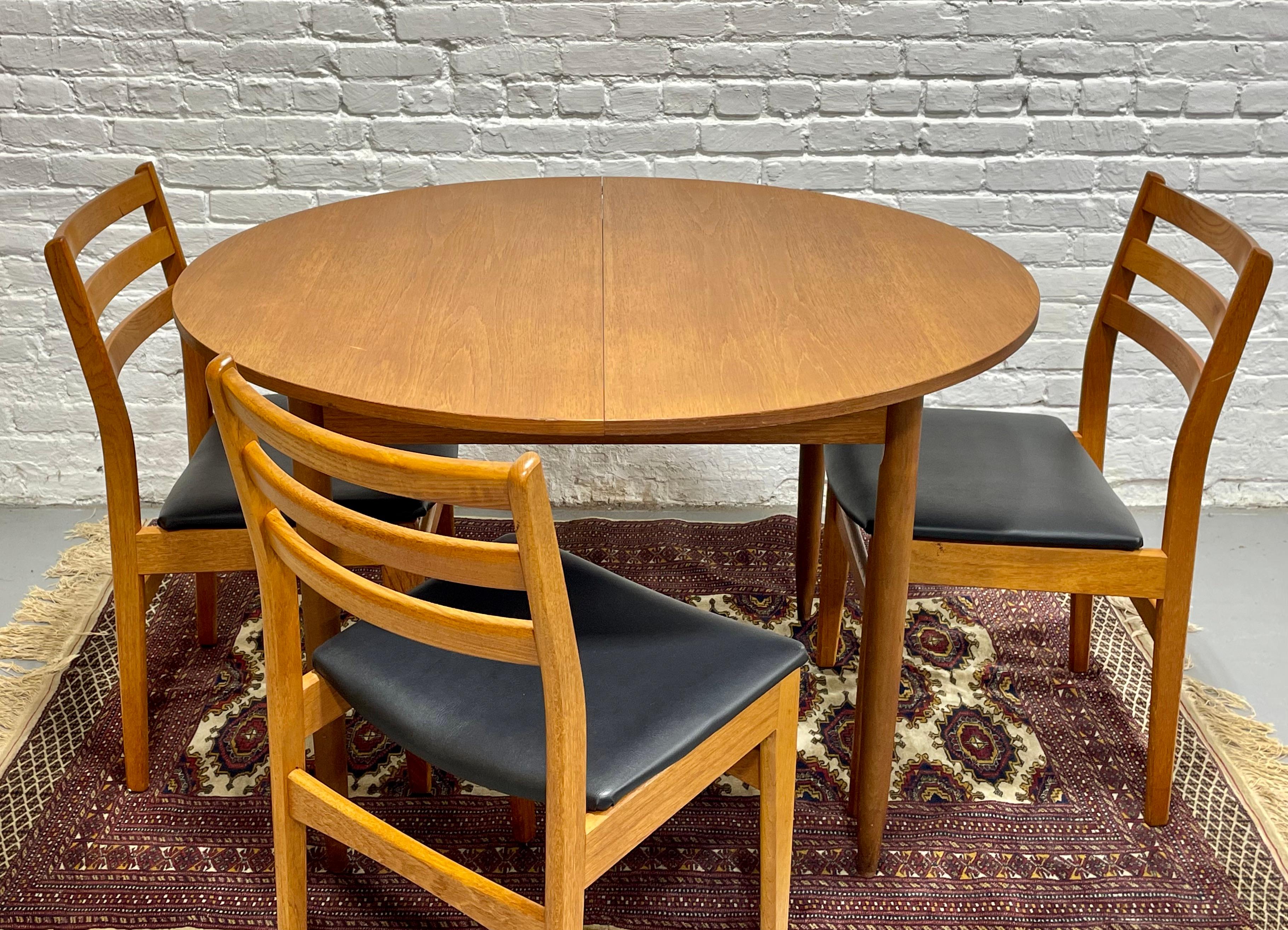 Mid Century MODERN Teak ROUND to OVAL Dining Table, Made in Denmark. c. 1960s 1