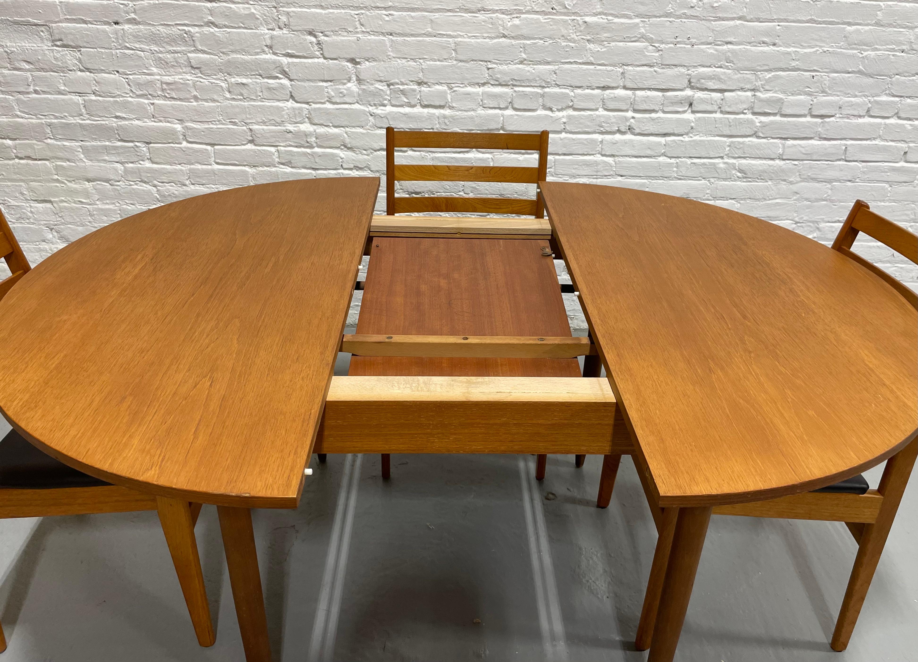 Mid Century MODERN Teak ROUND to OVAL Dining Table, Made in Denmark. c. 1960s 3